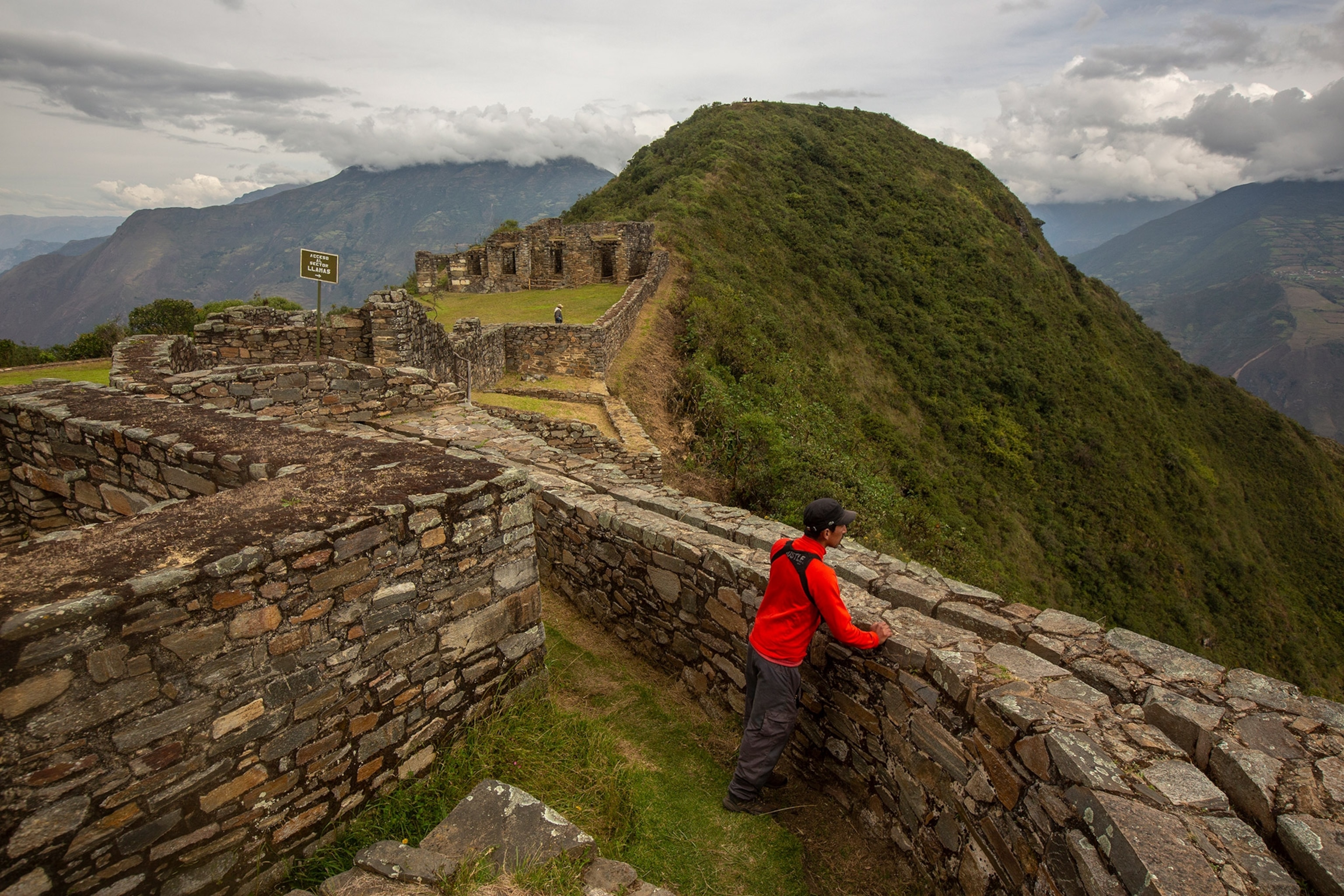Pablo Guevara, a local tourist walks towards the main entrance of the Hanan(higher) area of the Choquequirao archaeological center