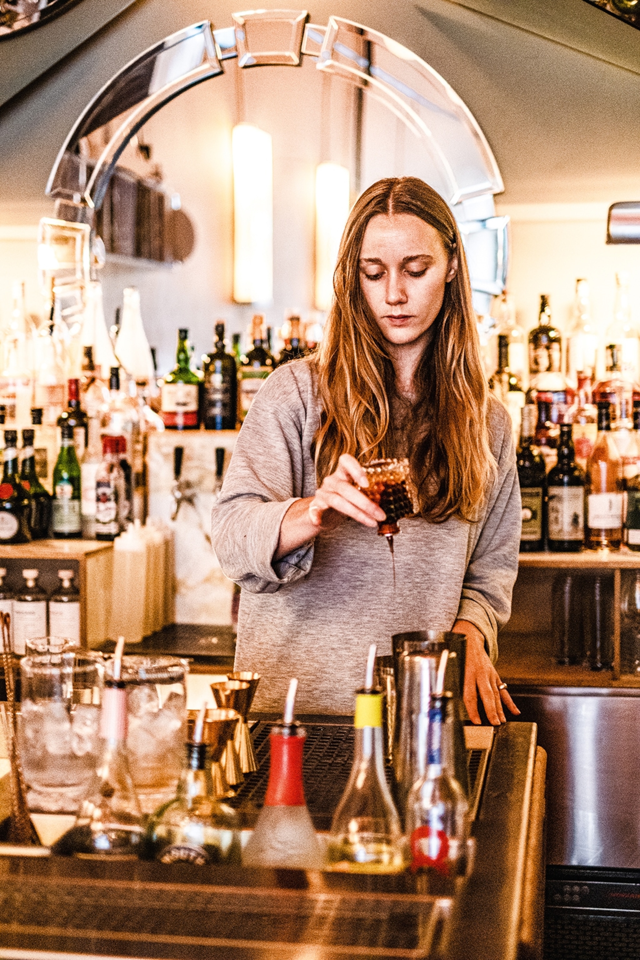 A bartender preparing a cocktail at the Dangerous Club.
