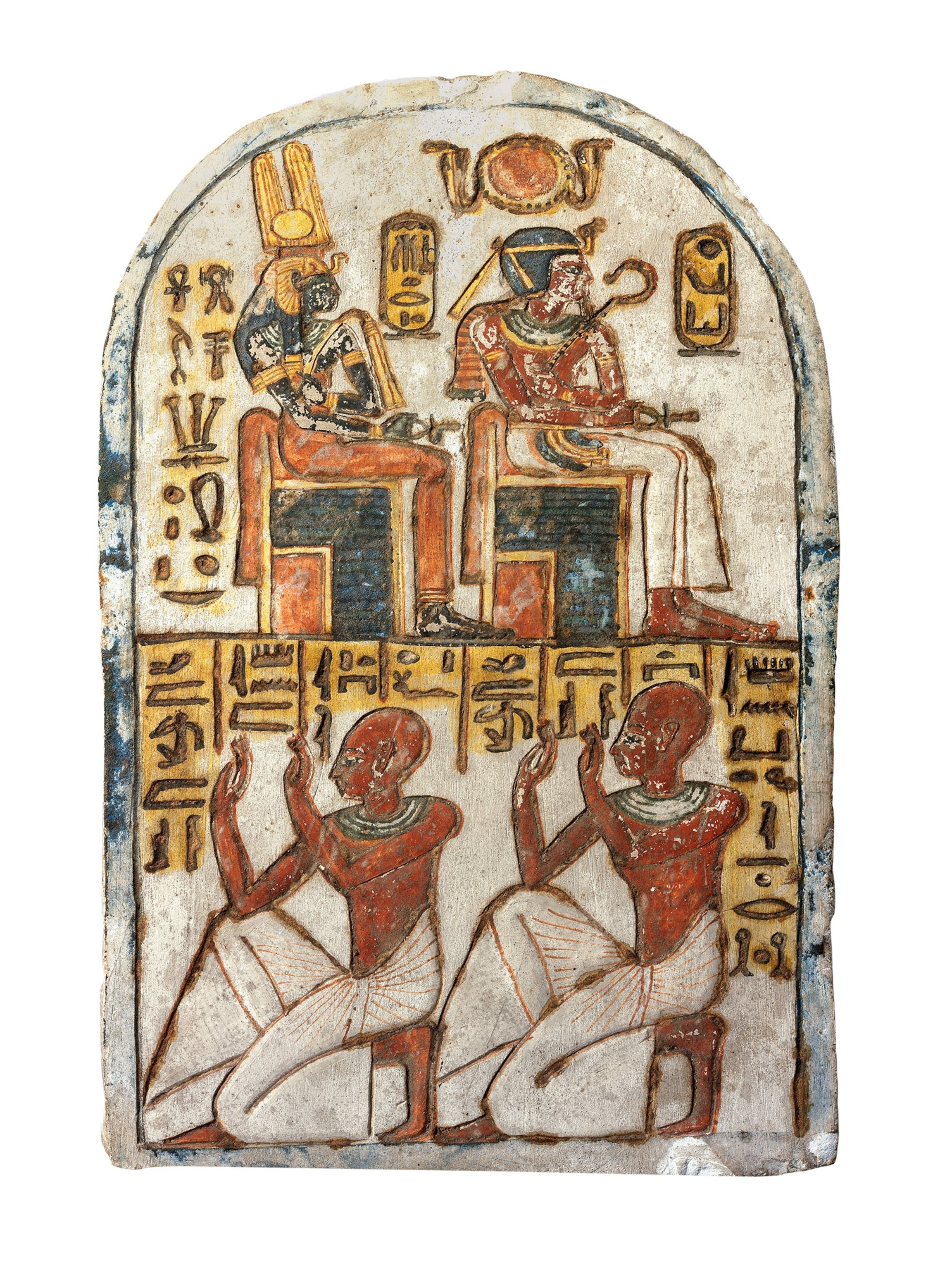 A stone slab covered in hieroglyphs and portraits of the royal family