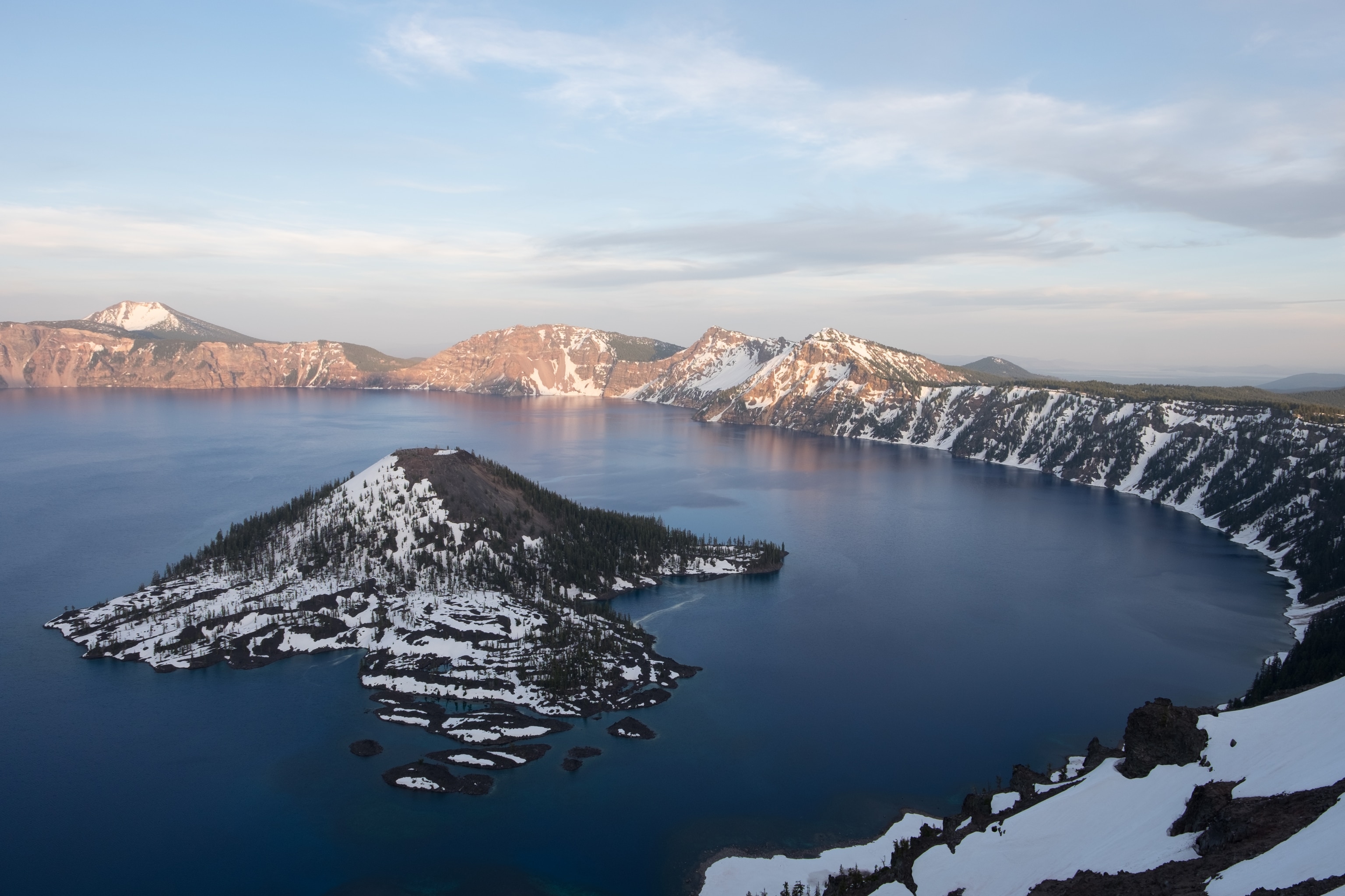 View of Crater Lake at overlook along the crater's rim in Crater Lake National Park.