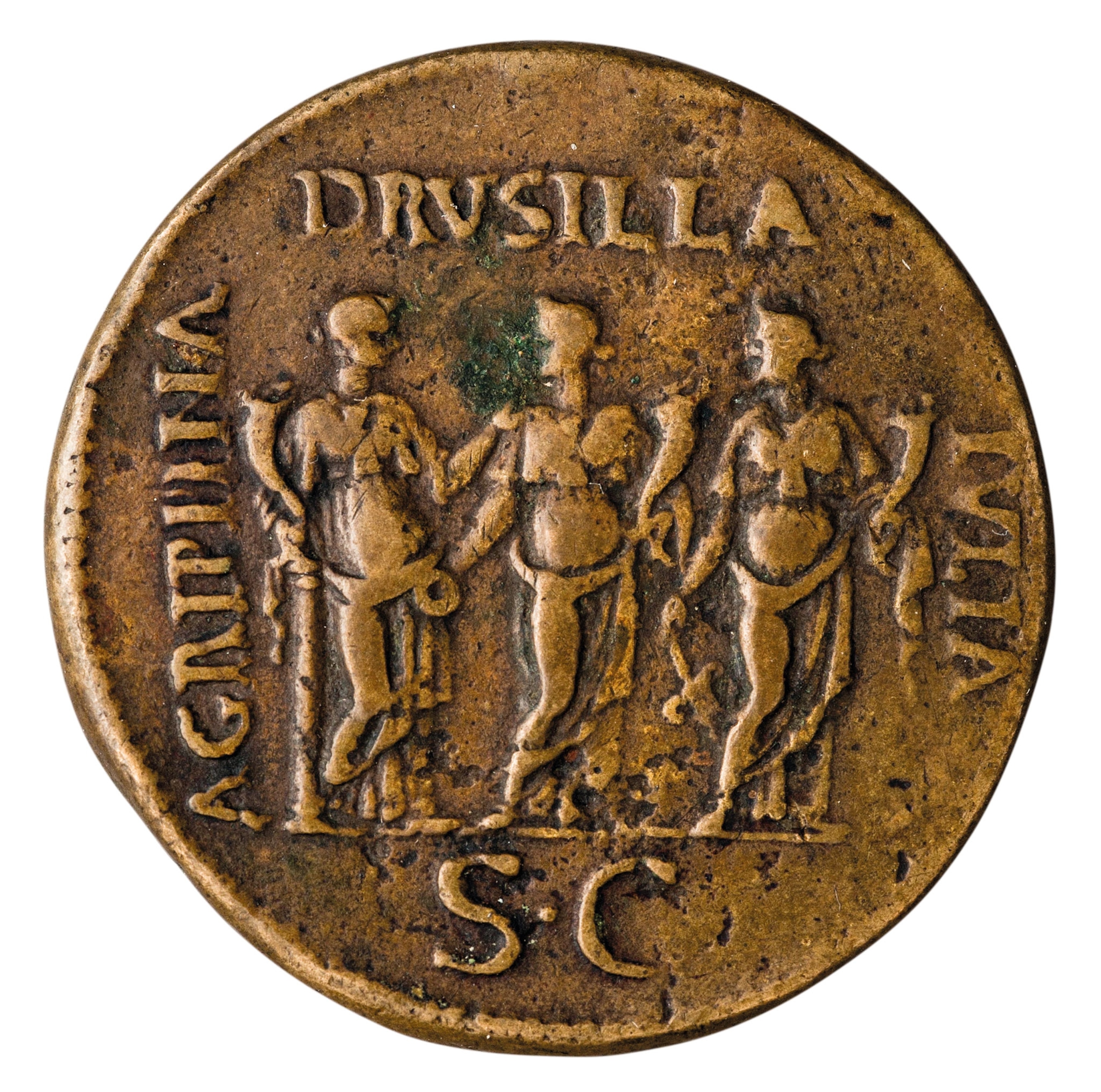 A coin with three women on it