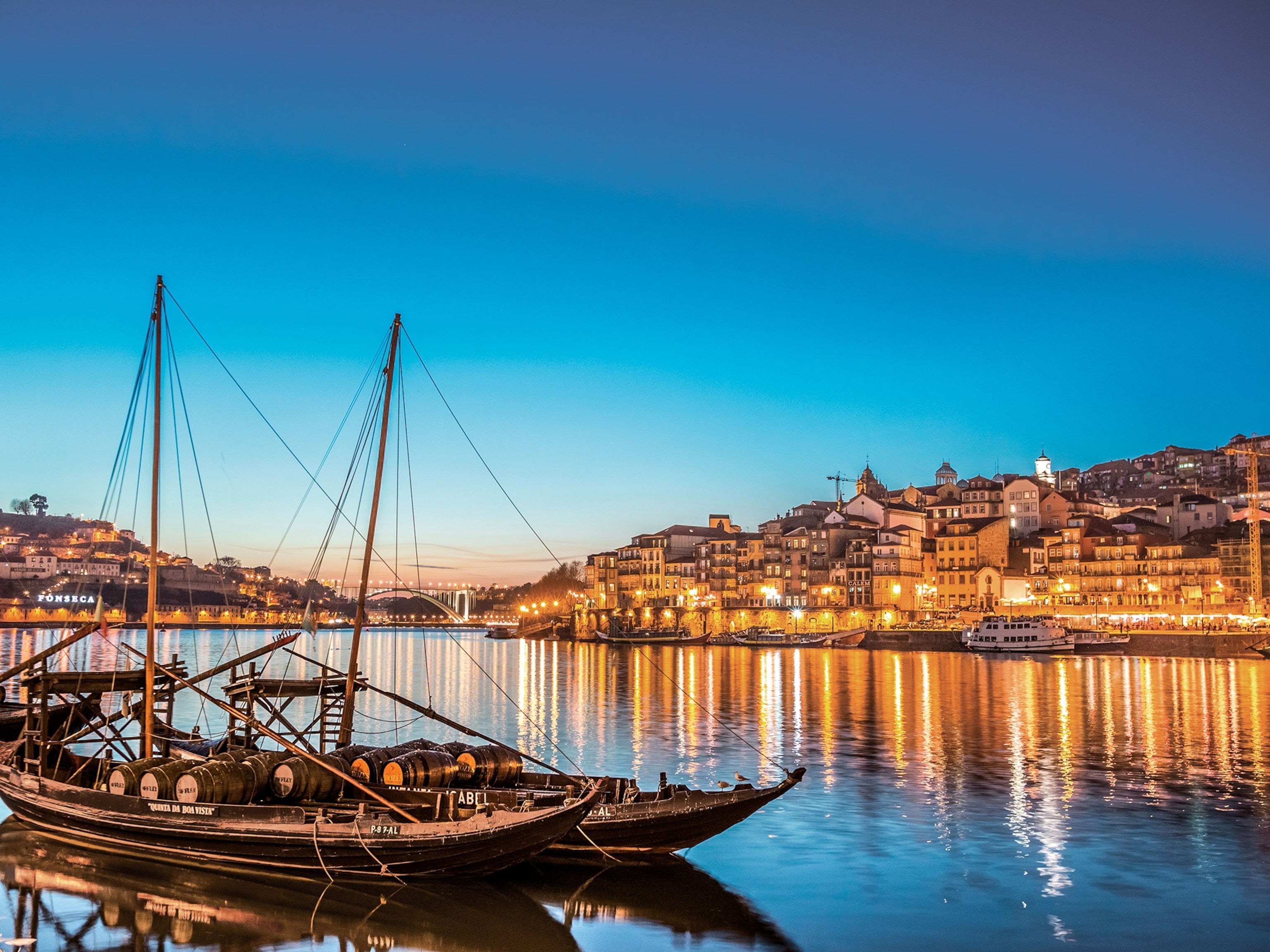 tourist boats on the Douro river in porto, portugal