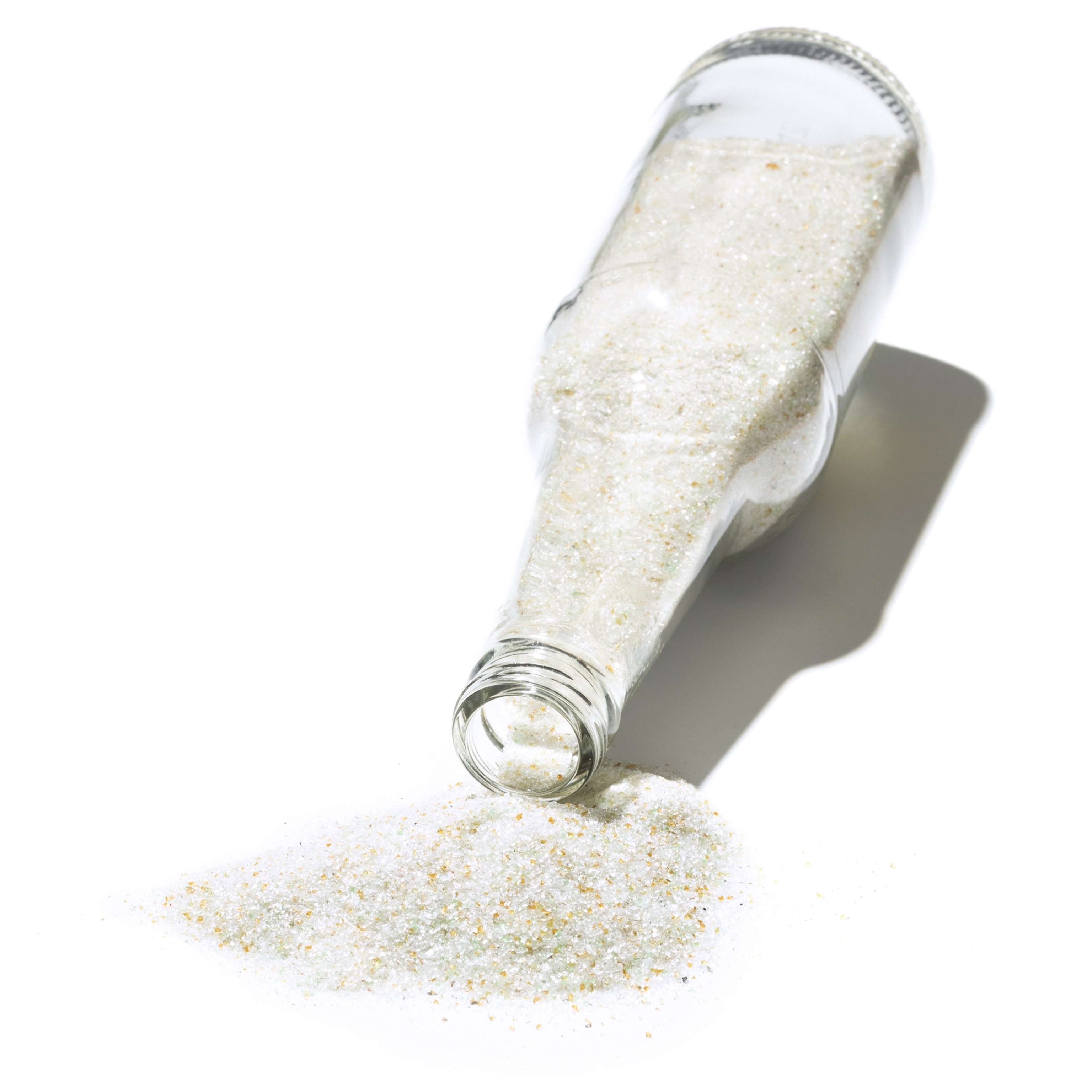 Picture of clear bottle with white sand