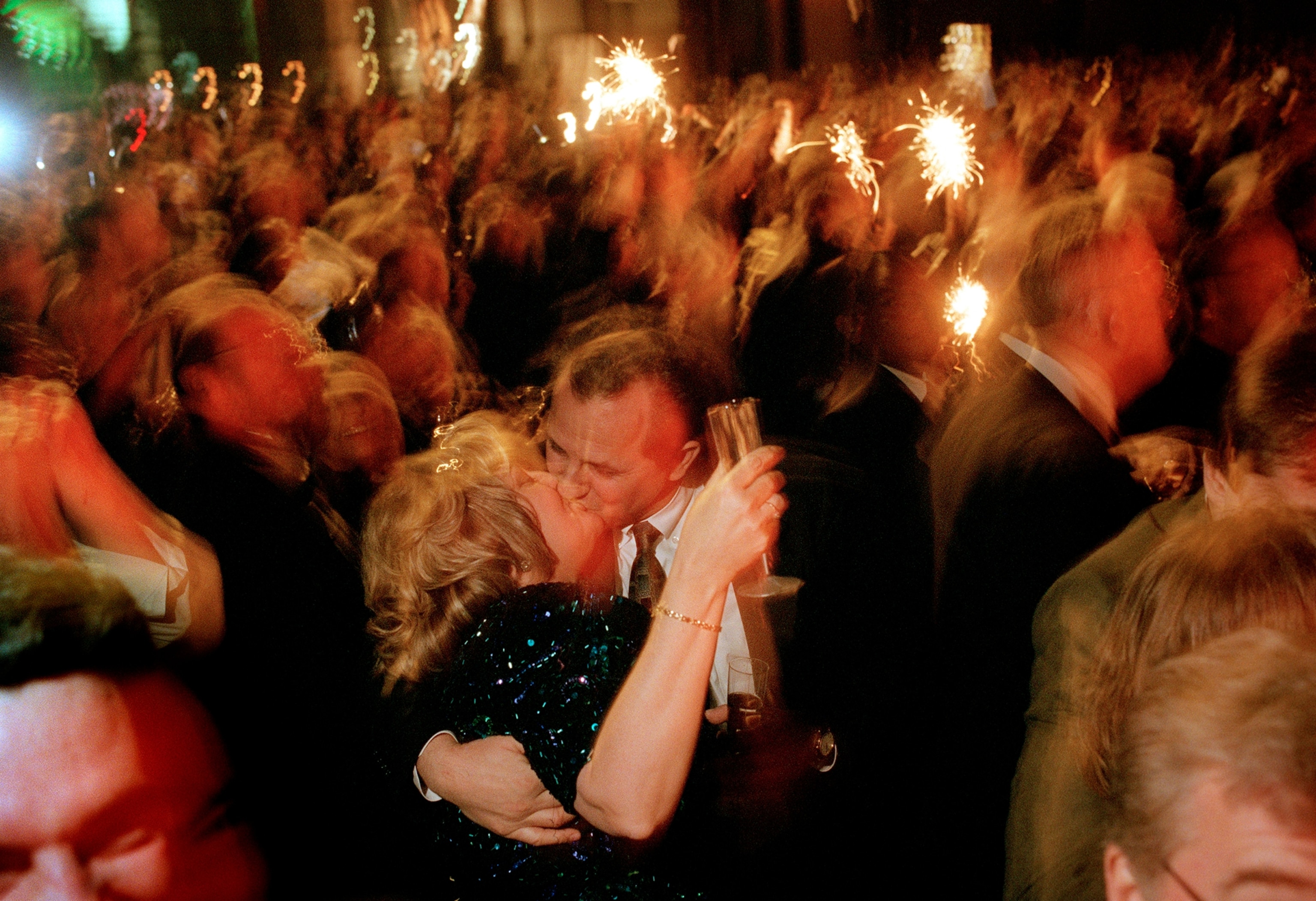 McCormick Place: Couple kissing at Mayor Daley's Millennium Ball welcome the new year and millennium. The Mayor invited people from approximately 175 countries to attend the multimillion-dollar affair.
