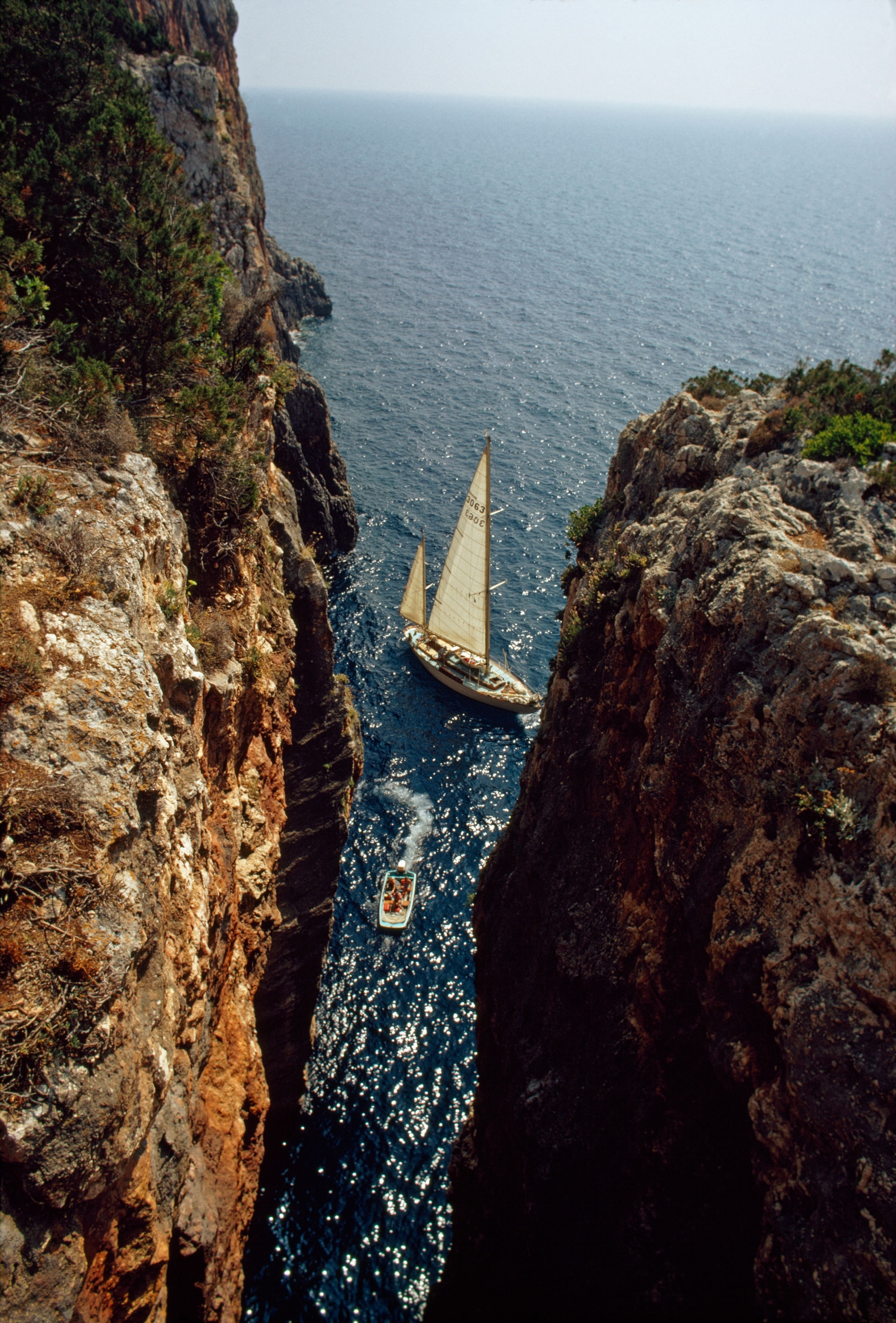 sailboats and cliffs in Greece