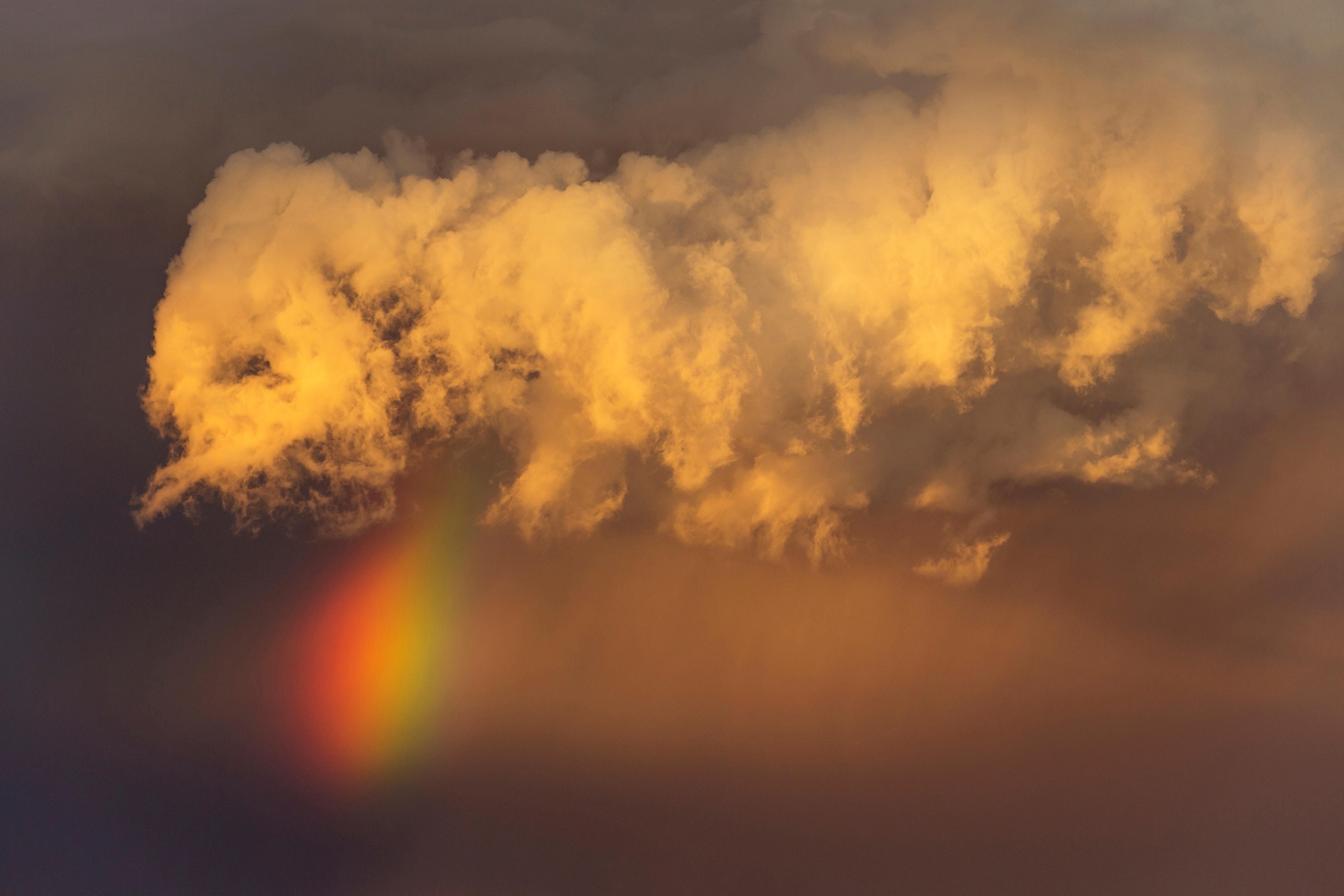 a cloud and a rainbow