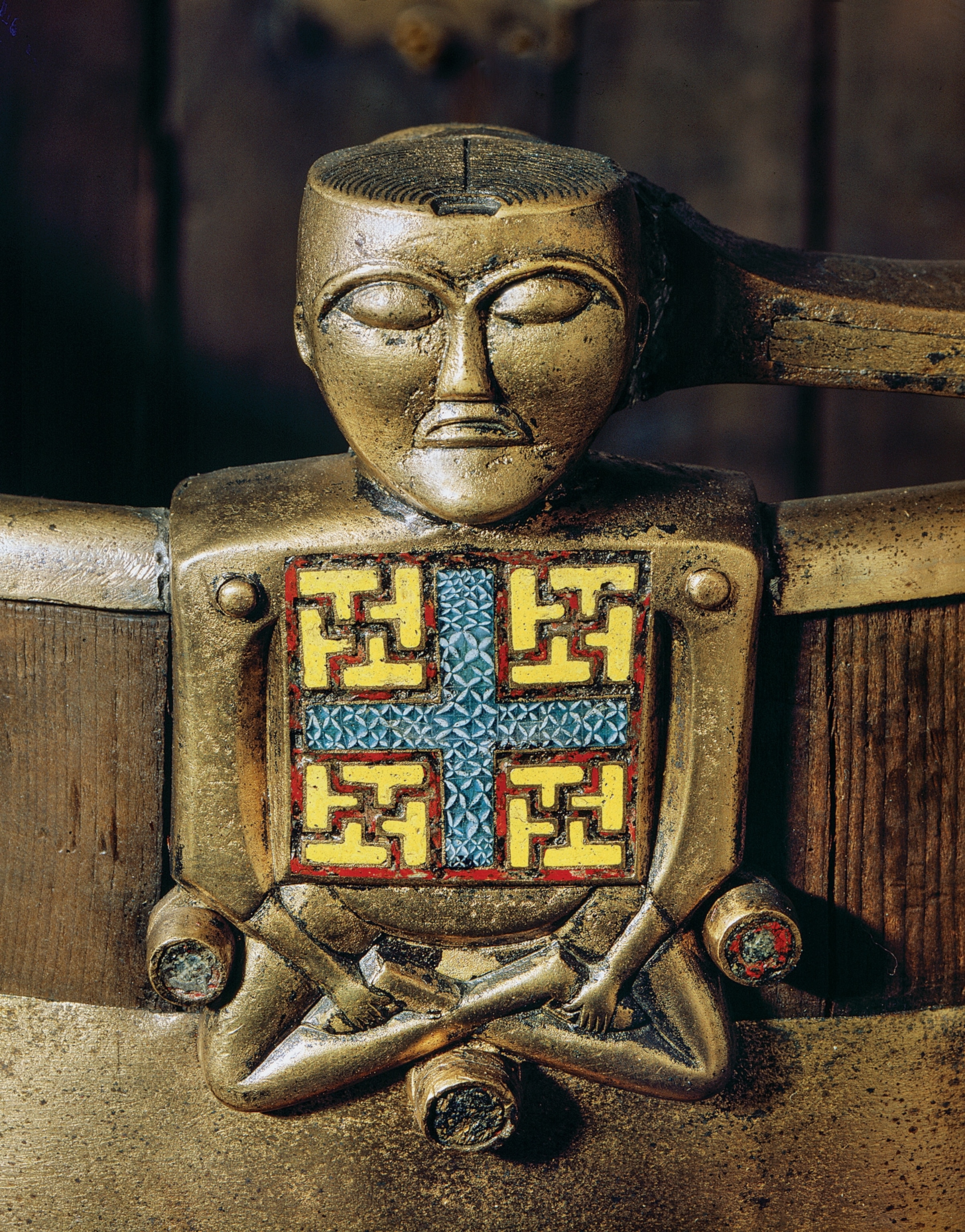 Known as the Oseberg Buddha, this figurine adorns an ornate bucket found on the ship.