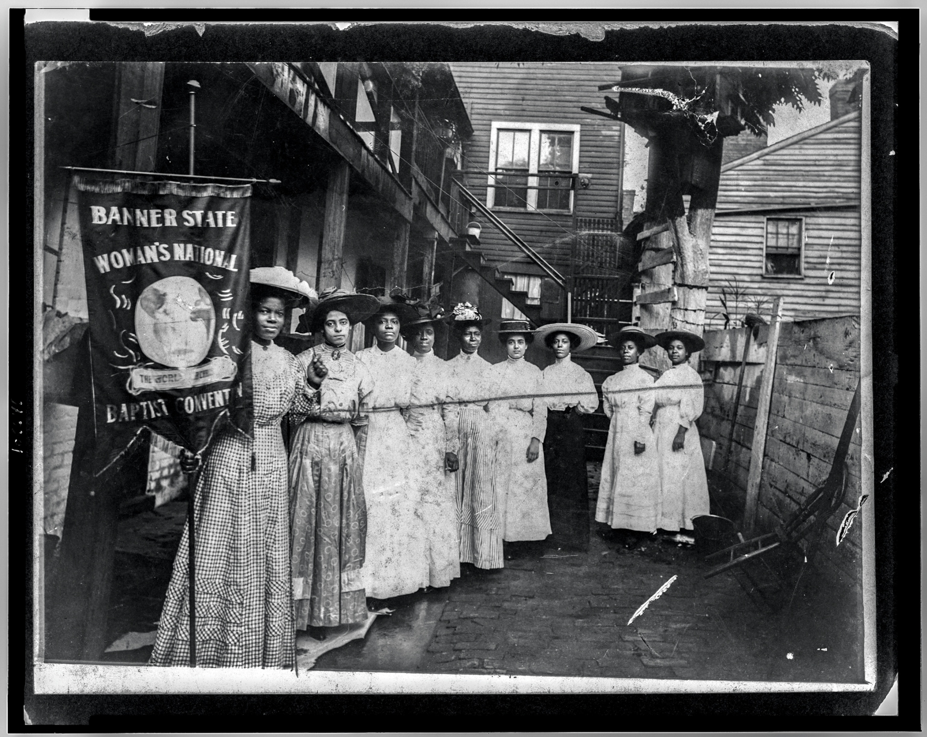 woman in white dresses standing in line