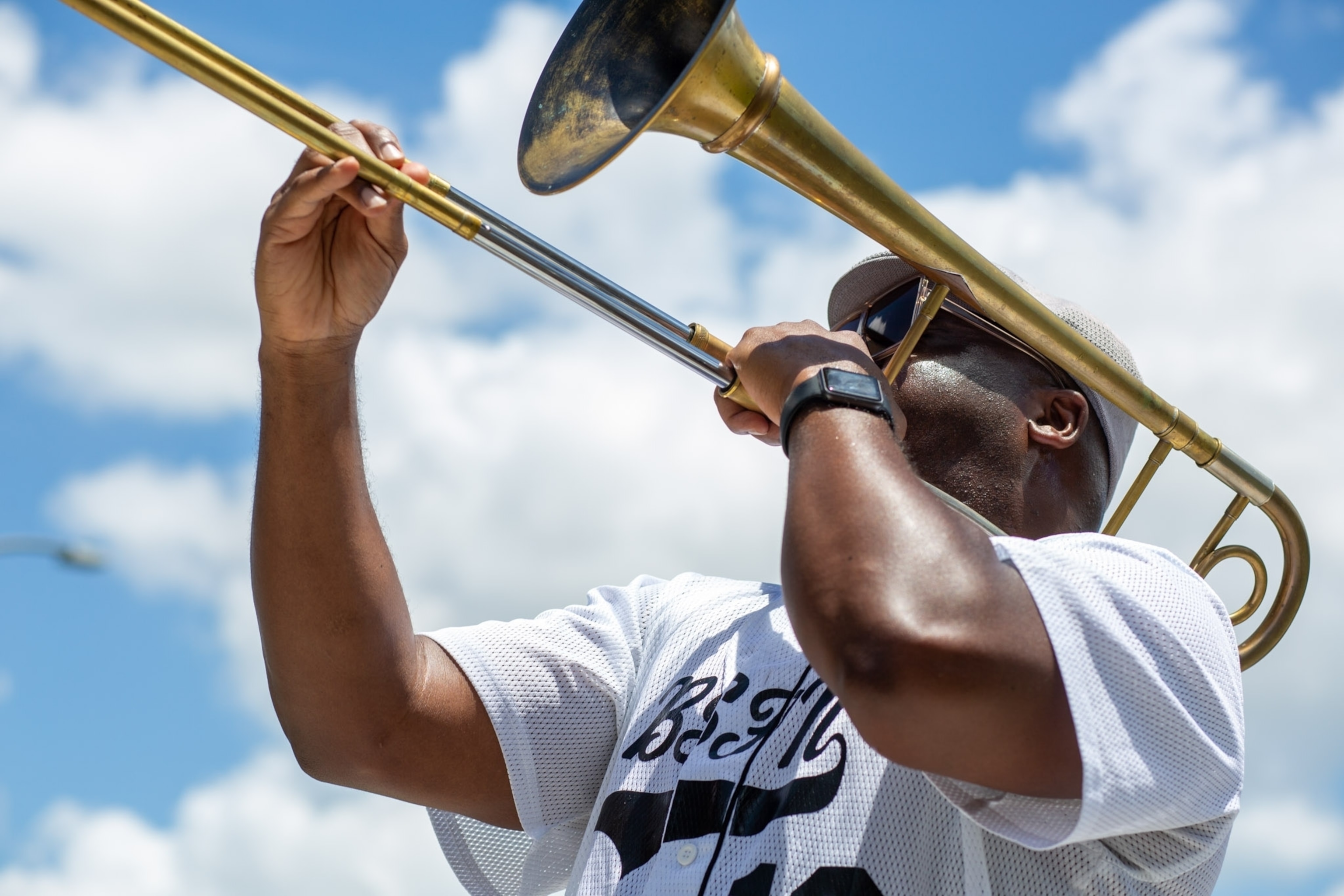 a person playing a trombone upward