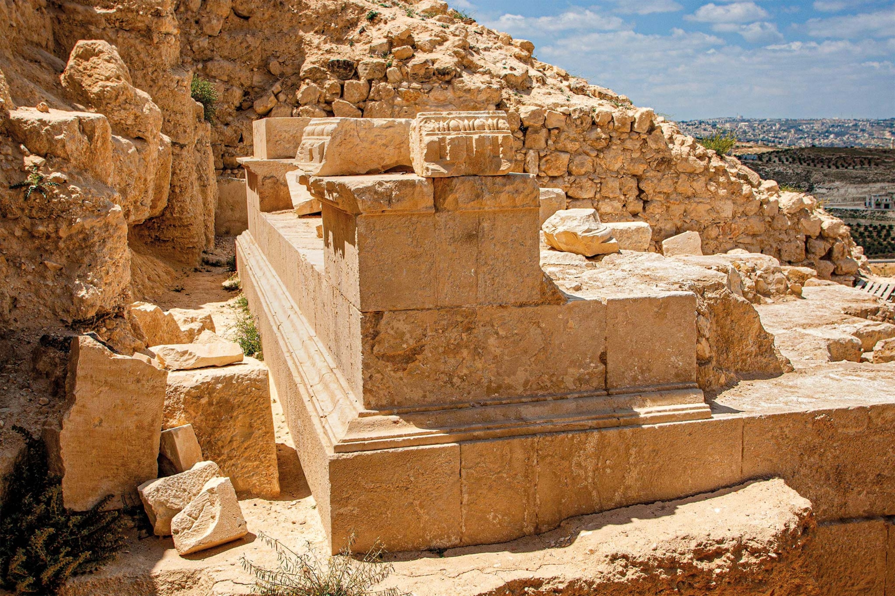 The podium base of the funerary building is pictured