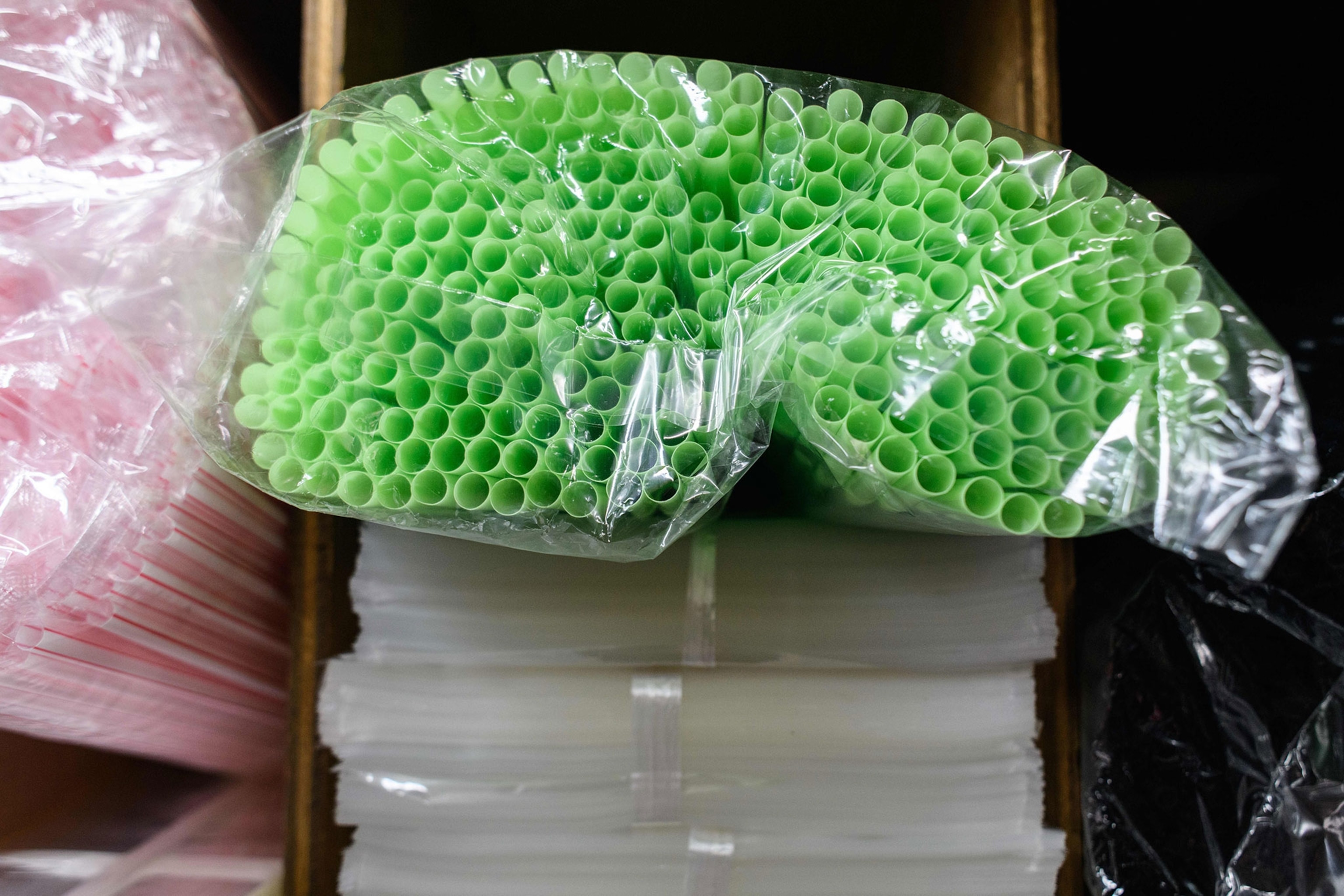 straws kept in plastic packaging in a plastics goods store in Hong Kong