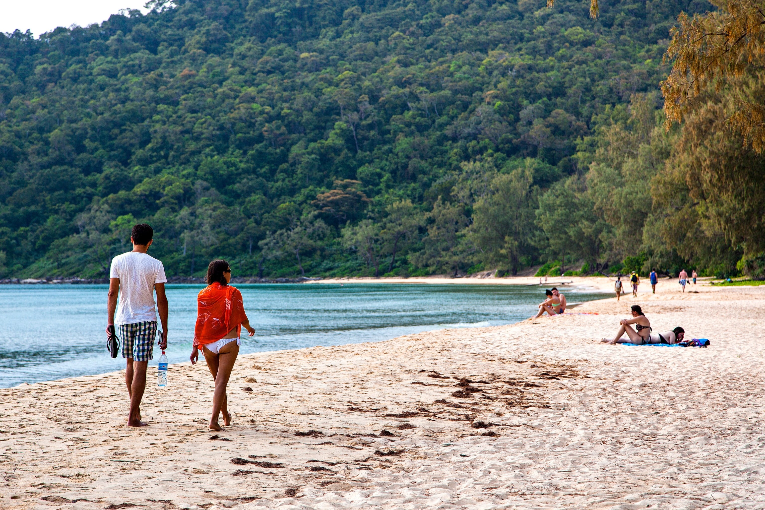people walking down Lazy Beach on Koh Rong Samloem Island, Cambodia