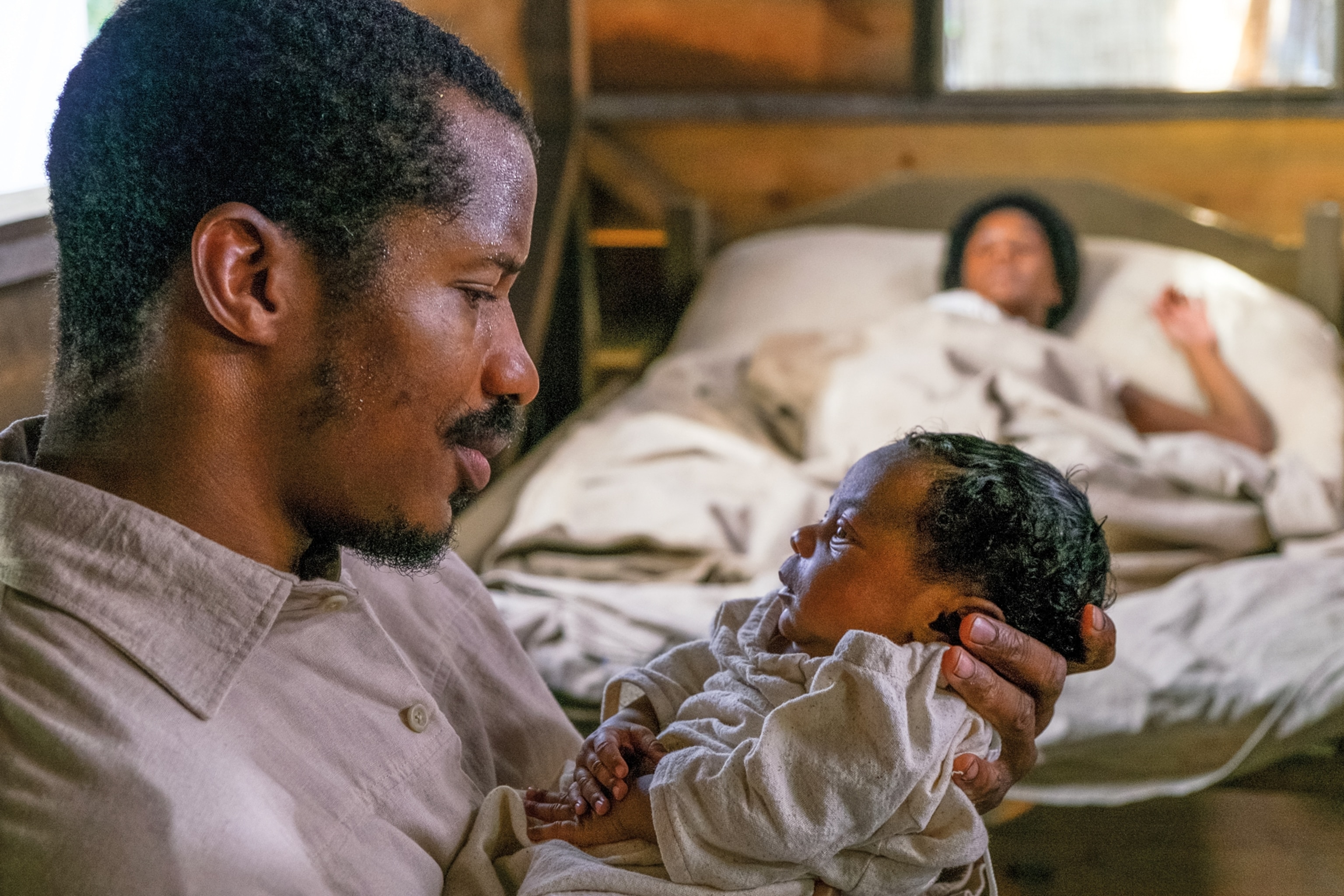 Nate Parker and Aja Naomi King as Nat Turner and his wife Cherry