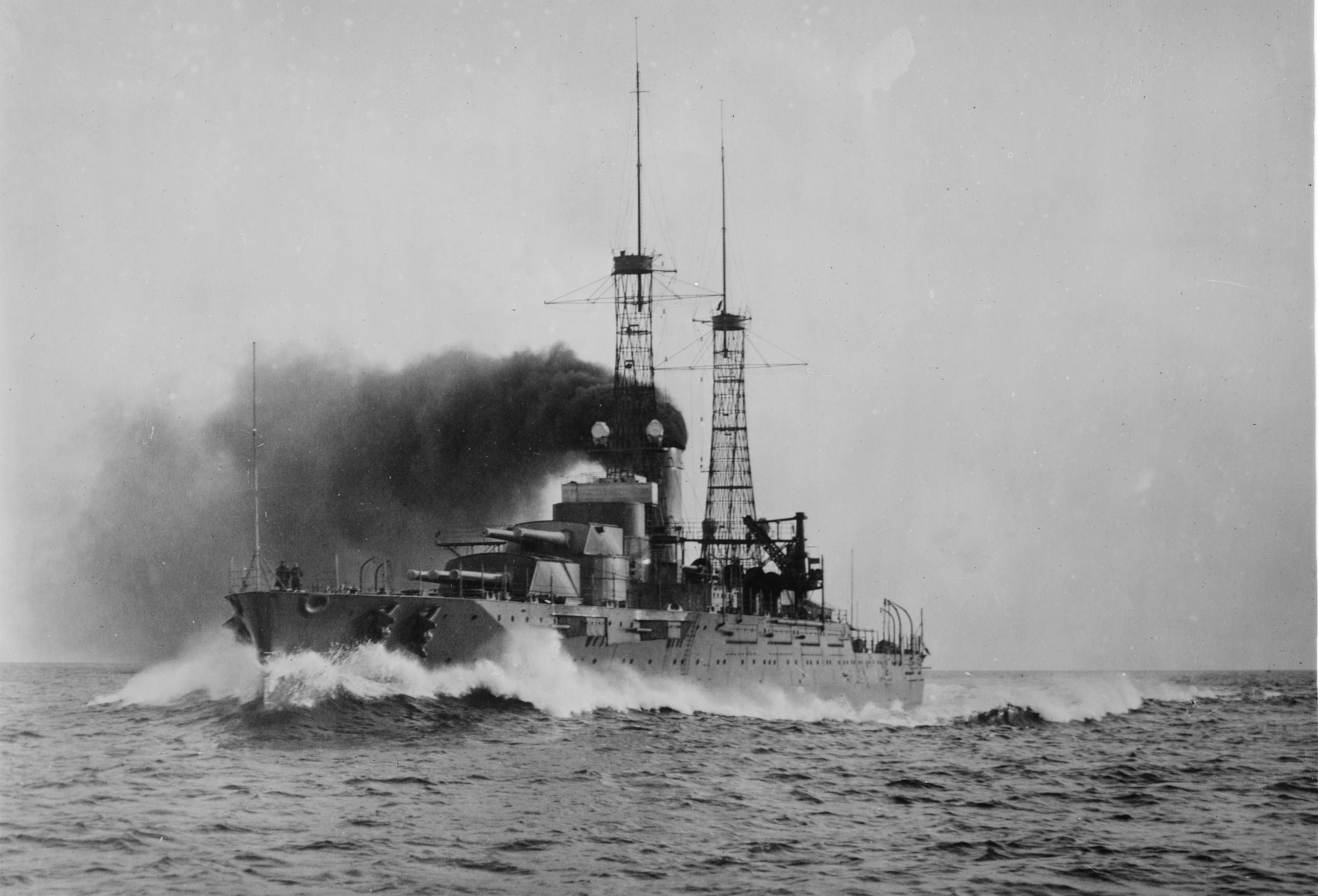 a great warship barreling through the water