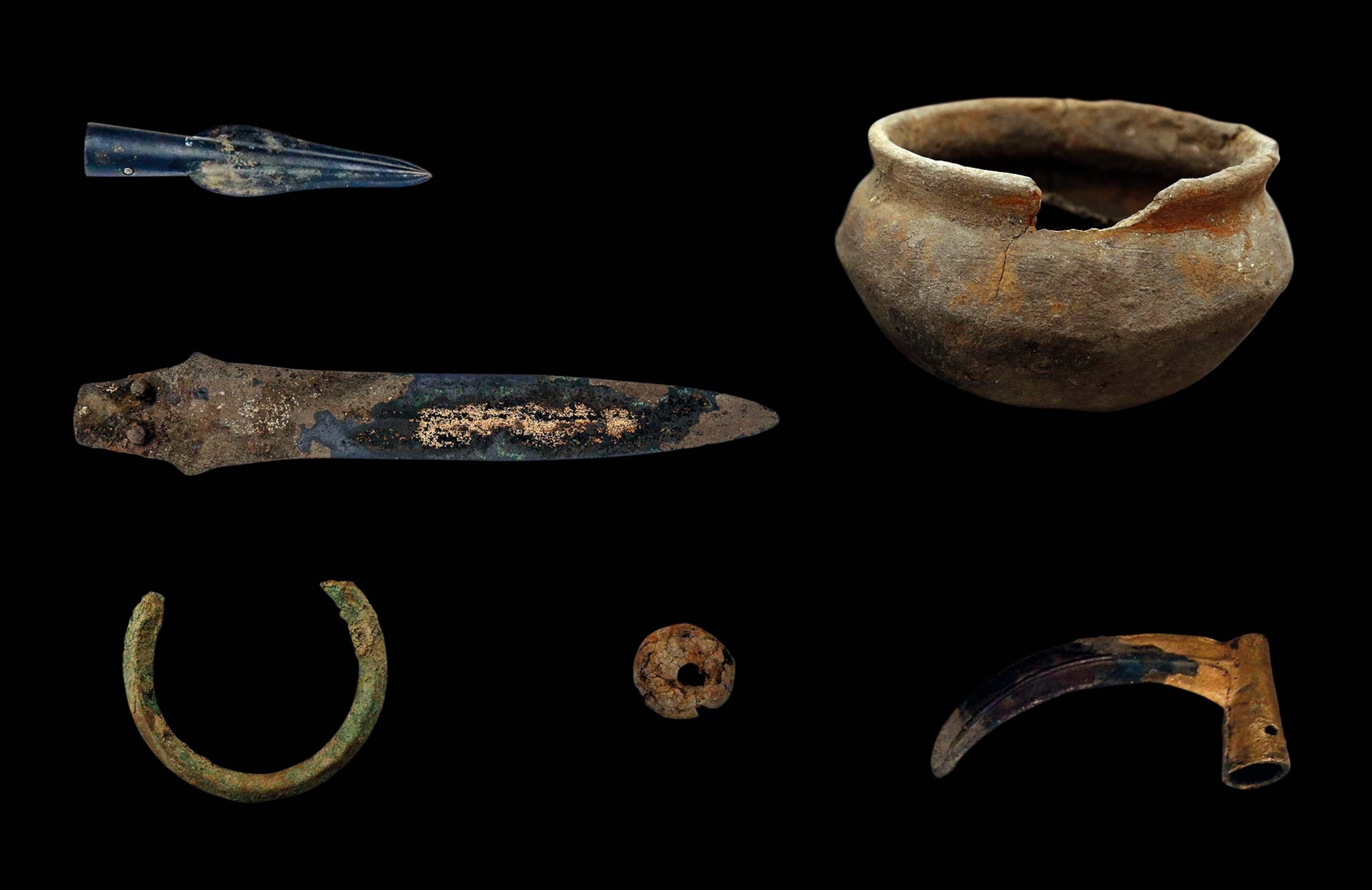 A collage of metal, clay, and glass artifacts from Must Farm, including blades, a ring, pottery, and a bead