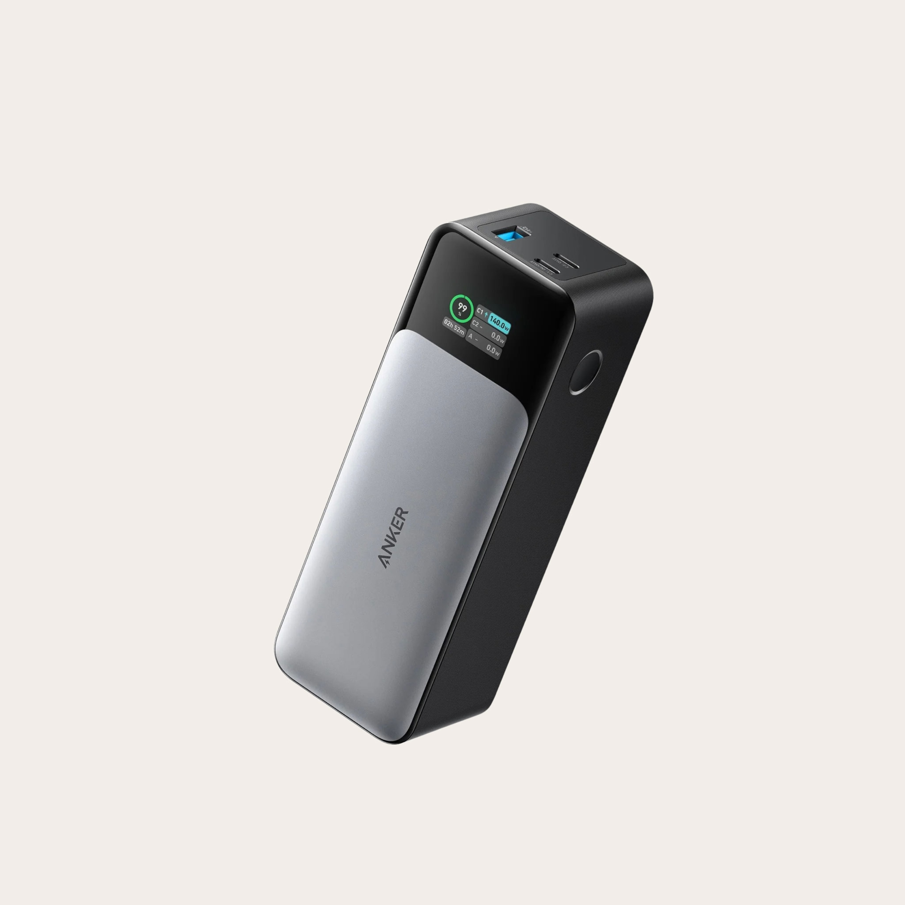 Black and grey portable charging block.