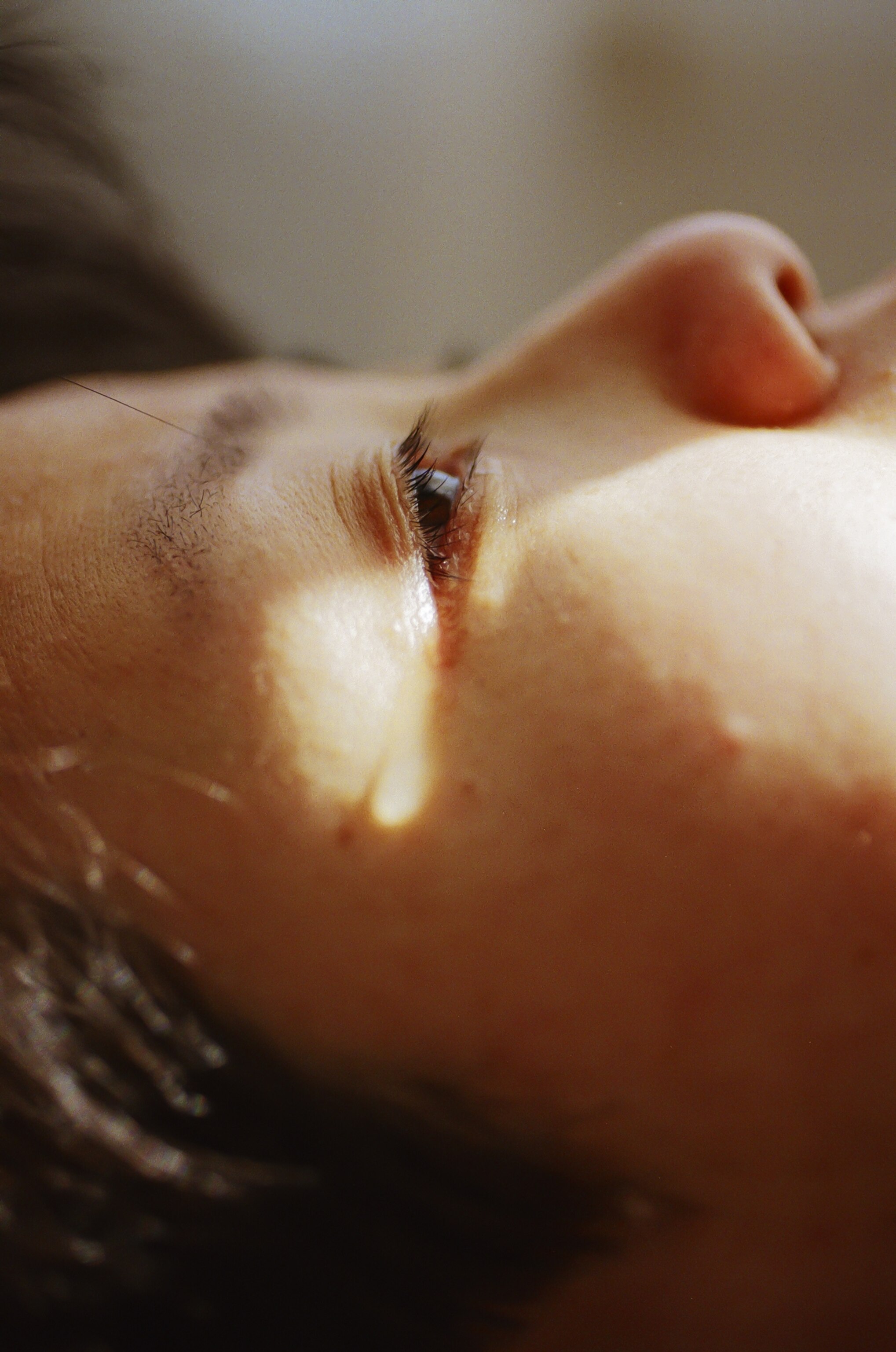 a tear running down someone's face
