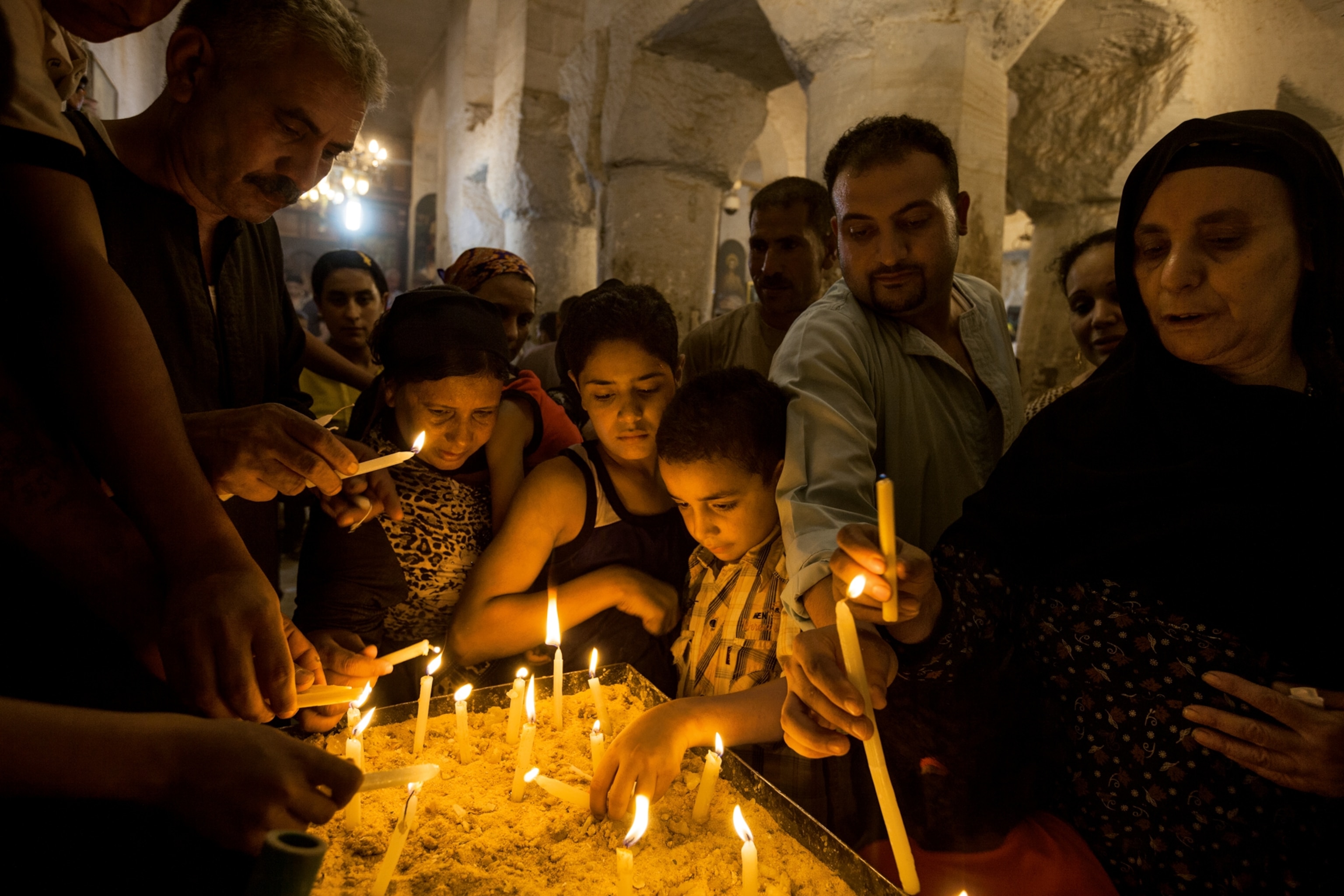 Muslims and Christians lighting candles to commemorate the Holy Family's stay in Egypt