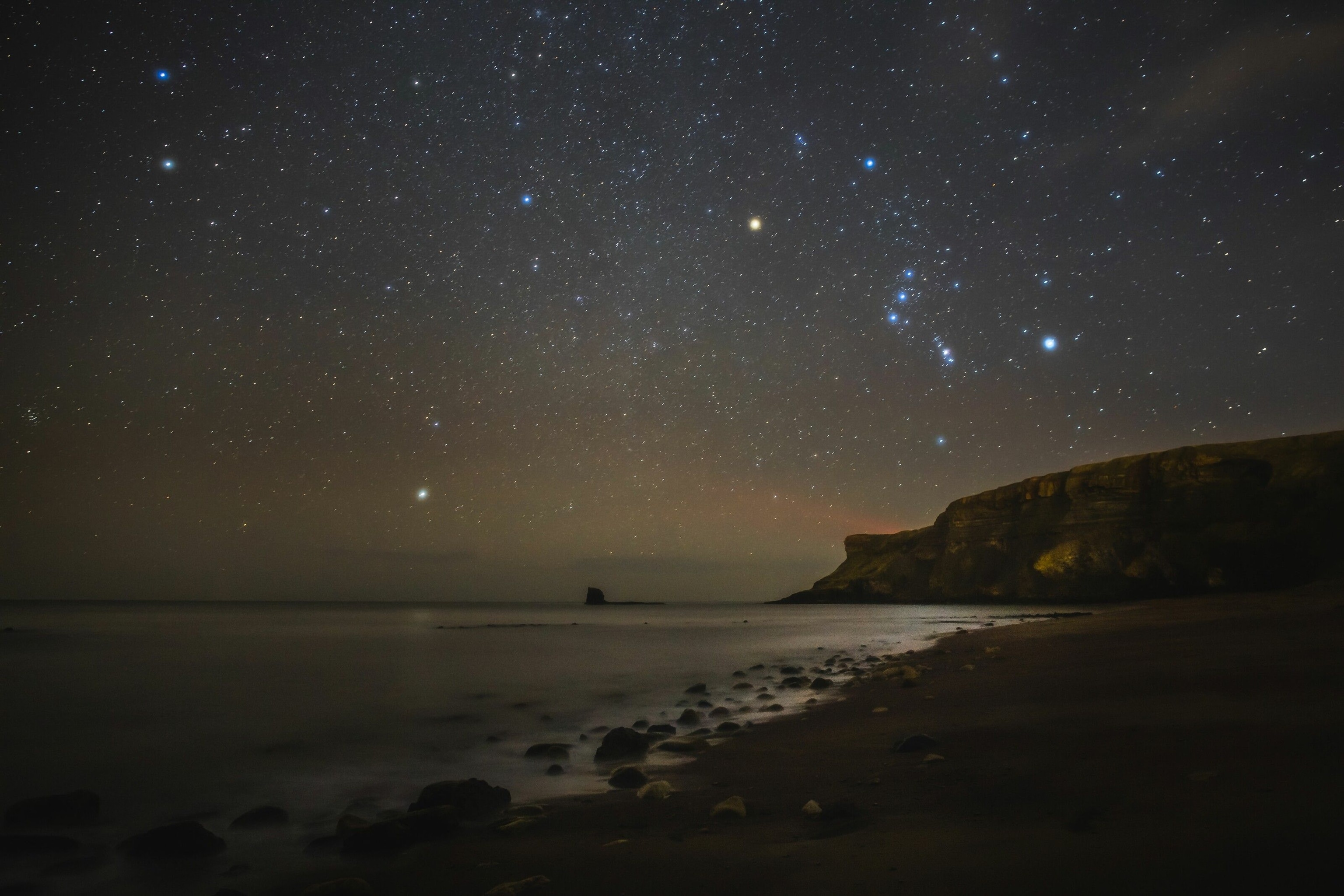 An Orion constellation over Saltwick Bay in the North York Moors coast, near Whitby.