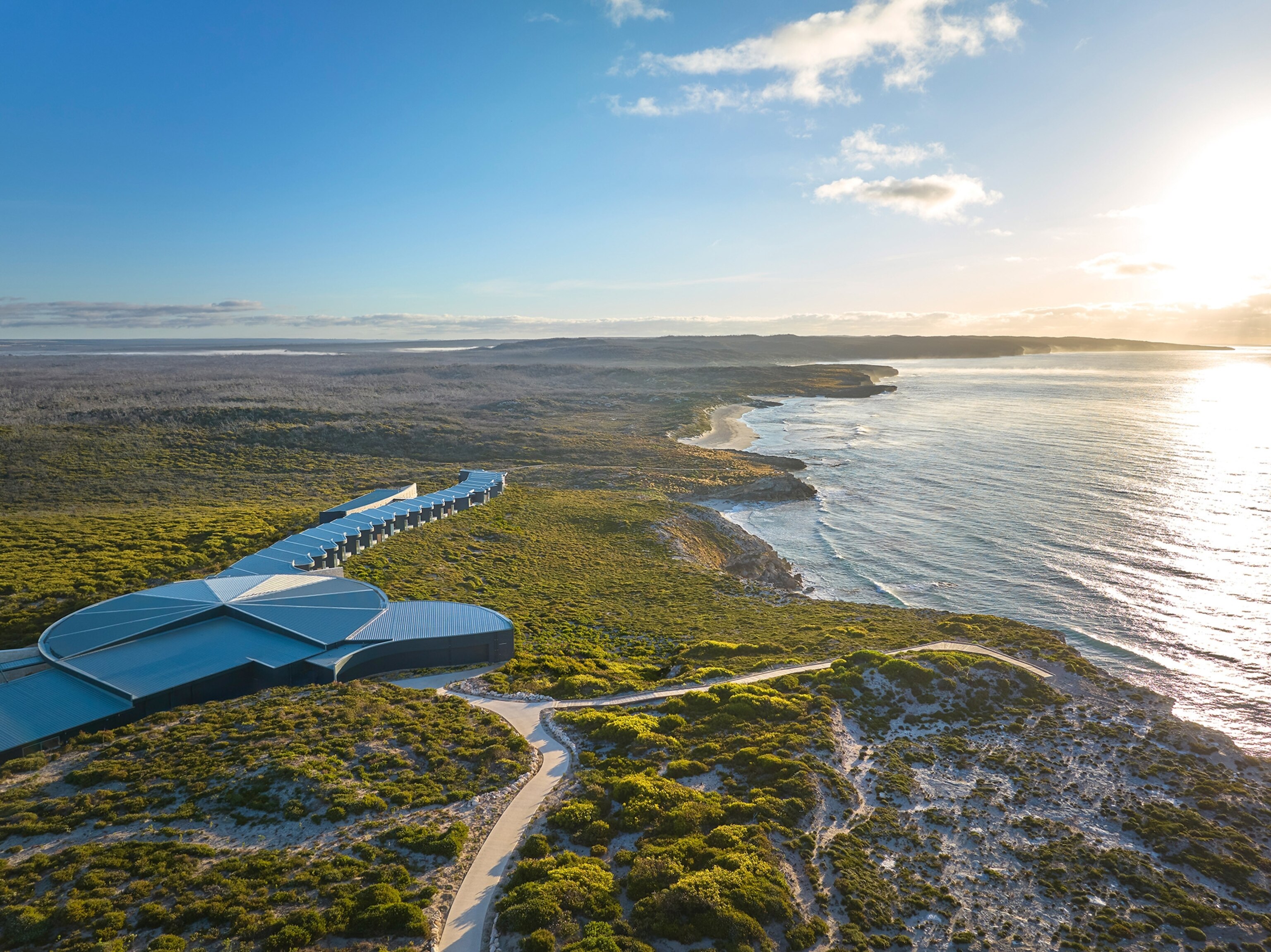 An aerial of the Southern Ocean Lodge and ocean.