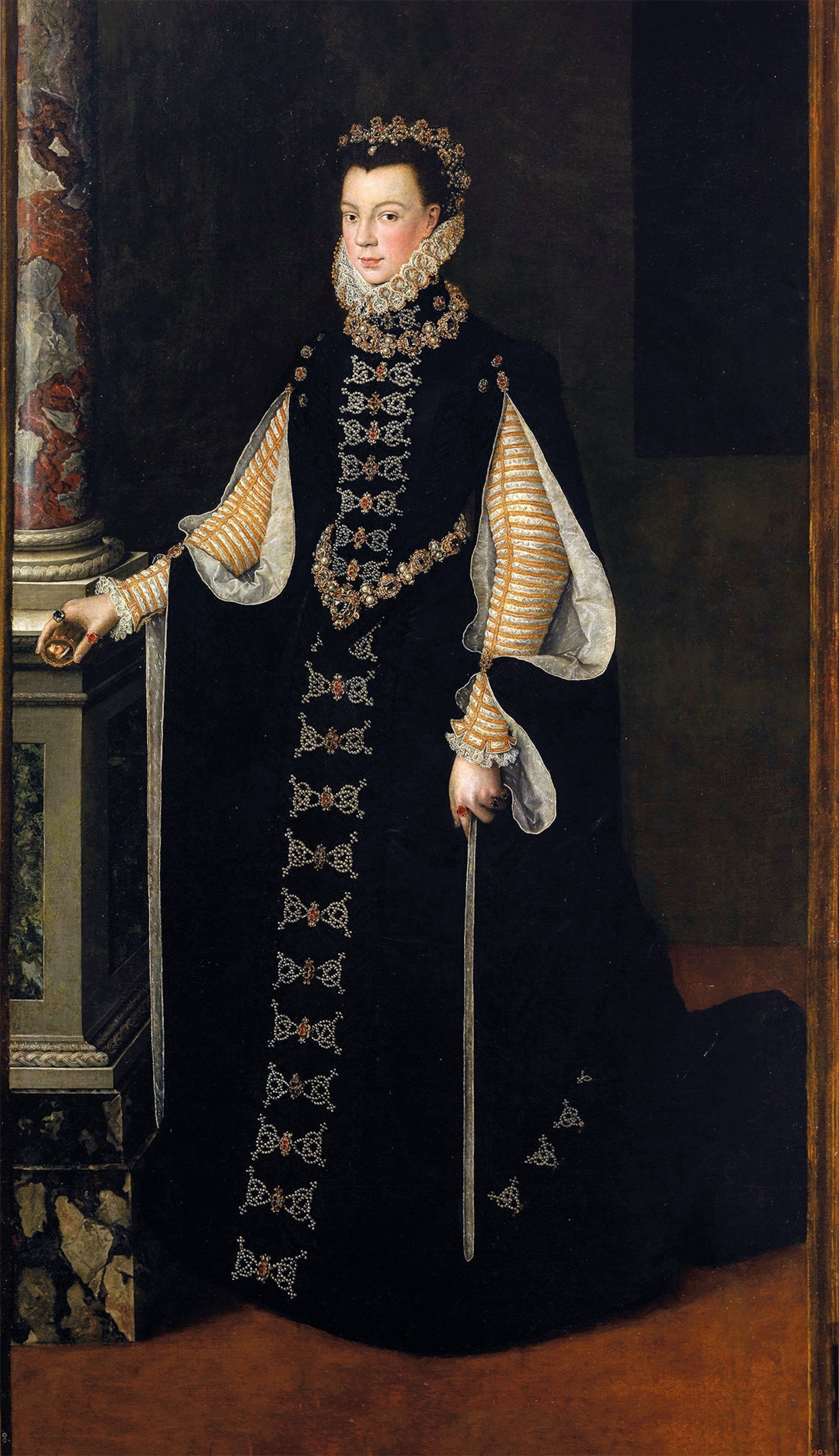 Sofonisba painted this portrait in the early 1560s. The teenaged Queen Isabel holds a small portrait of her husband, Philip II. Her dress is dark yet adorned with rubies and diamonds that glitter discreetly.