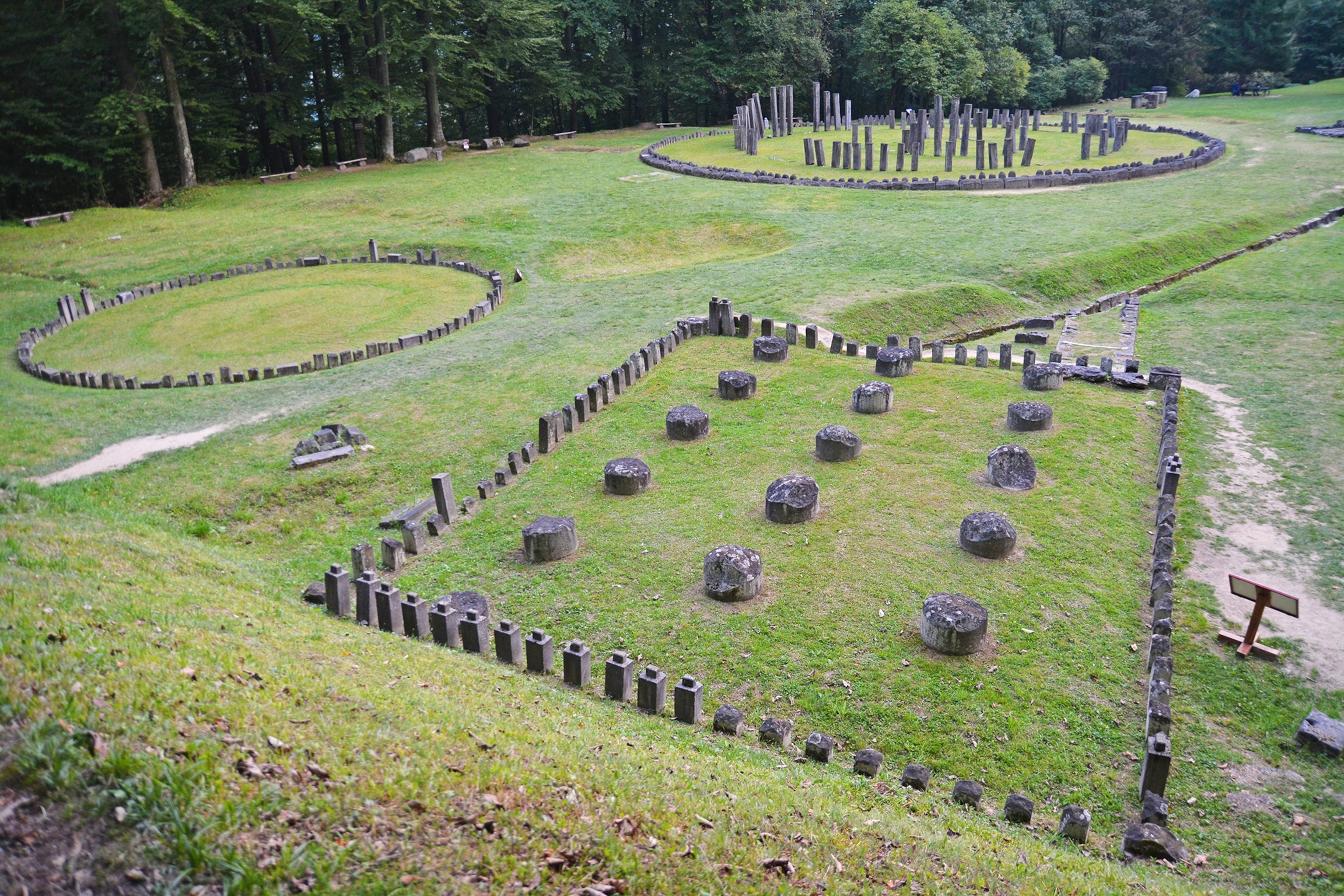Stone structures arranged on grass