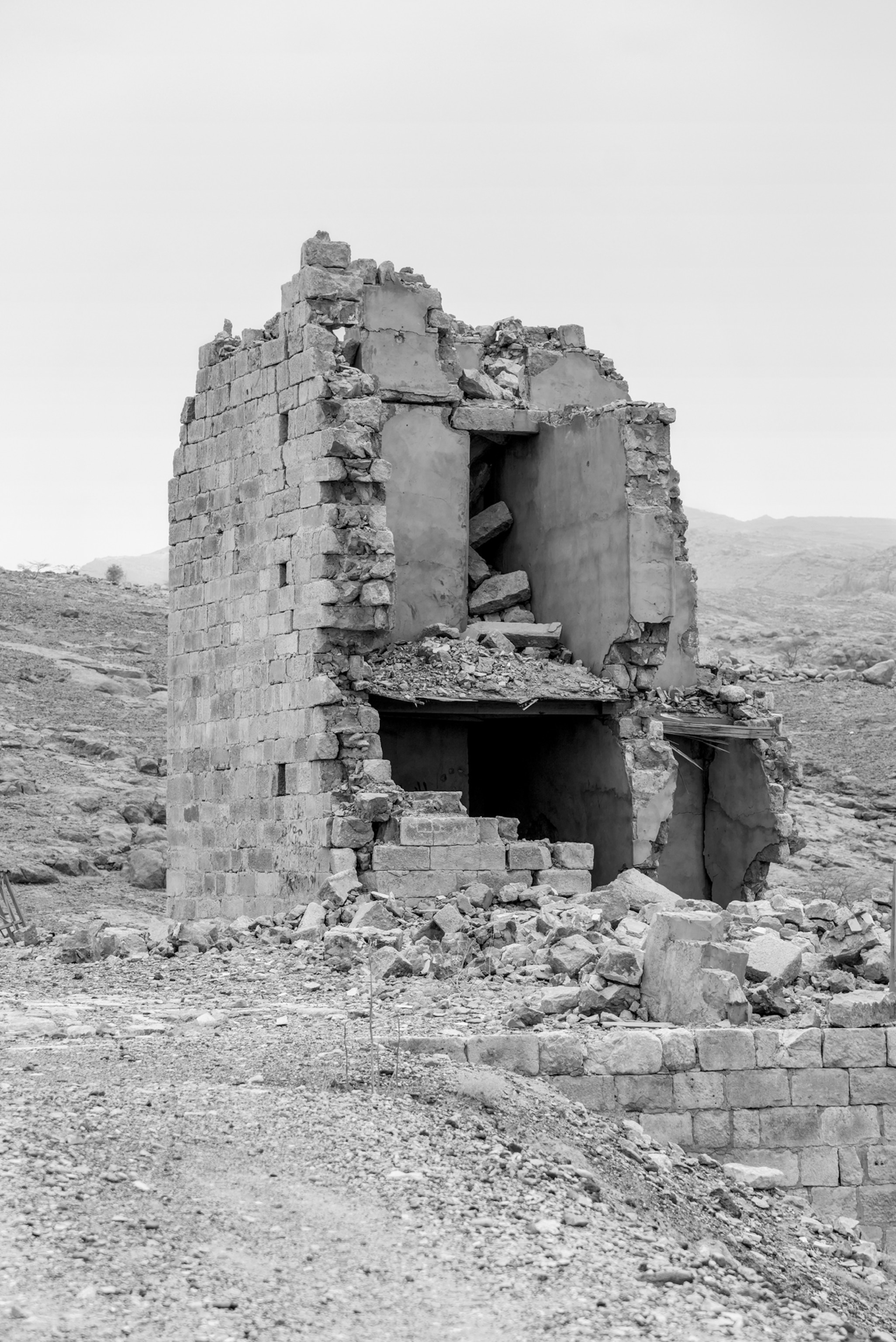 Picture of ruins of small brick structure.