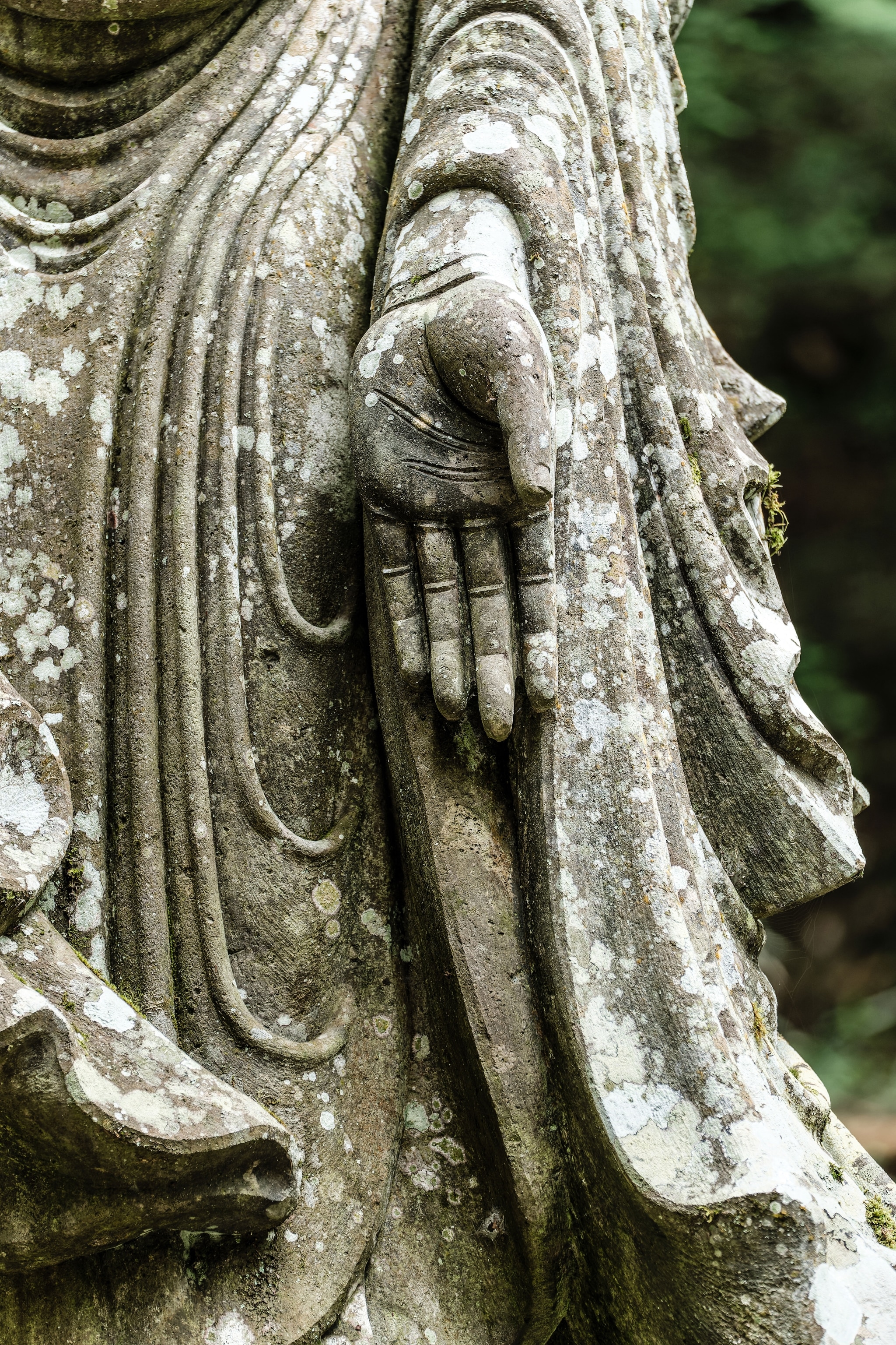 close up image of Buddha statue's hand