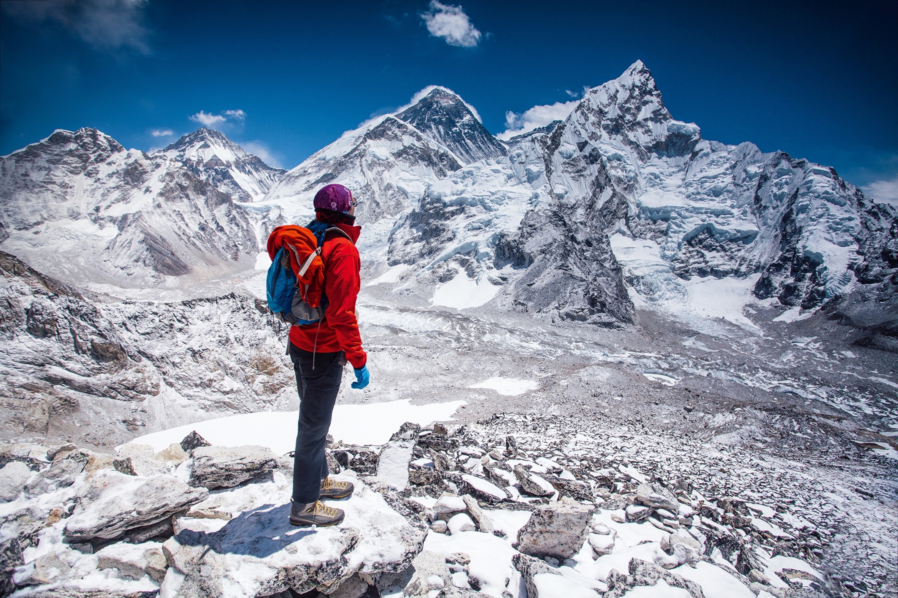 Trekker observing the view of the Himalayas.