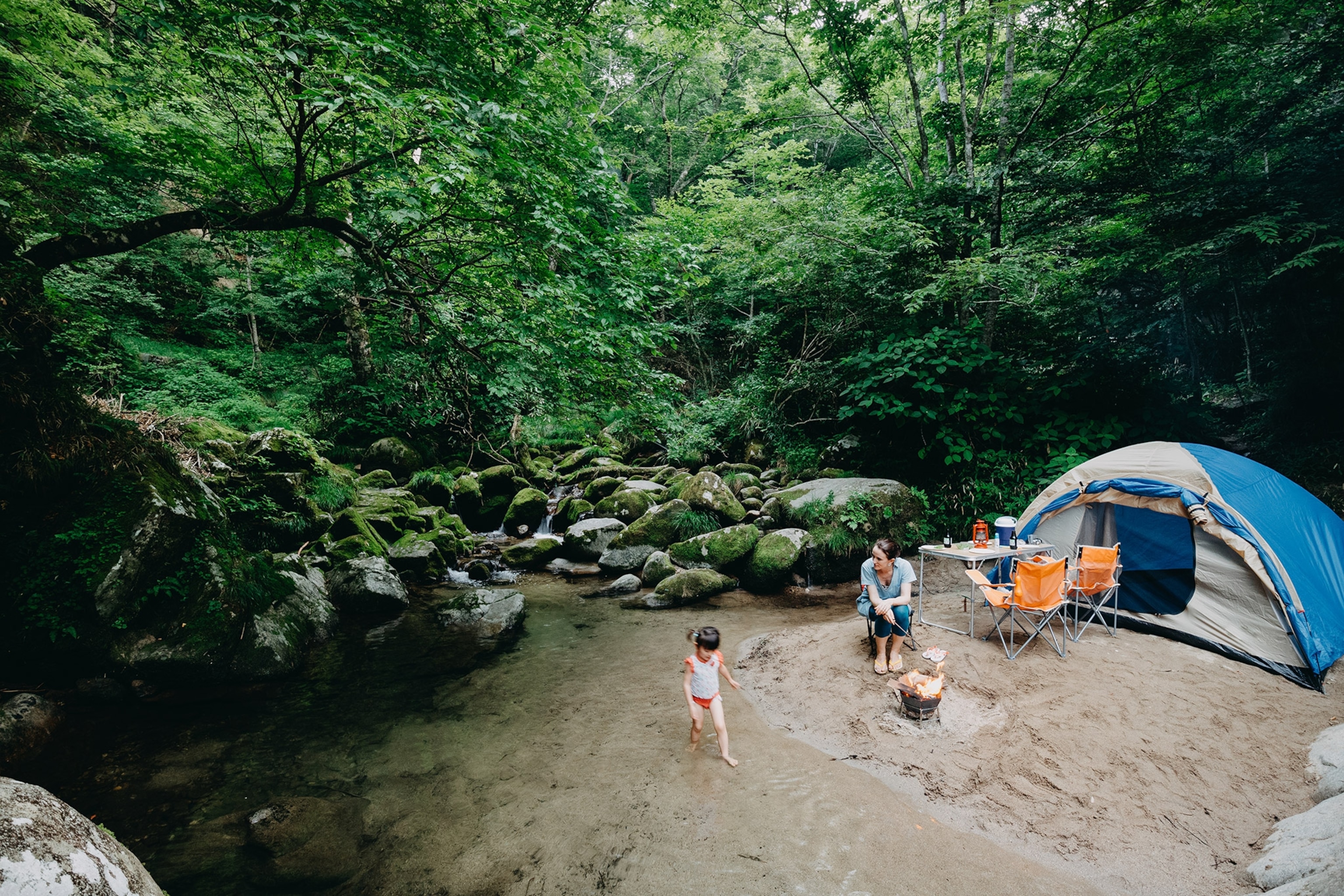 a mother and daughter camping in Japan