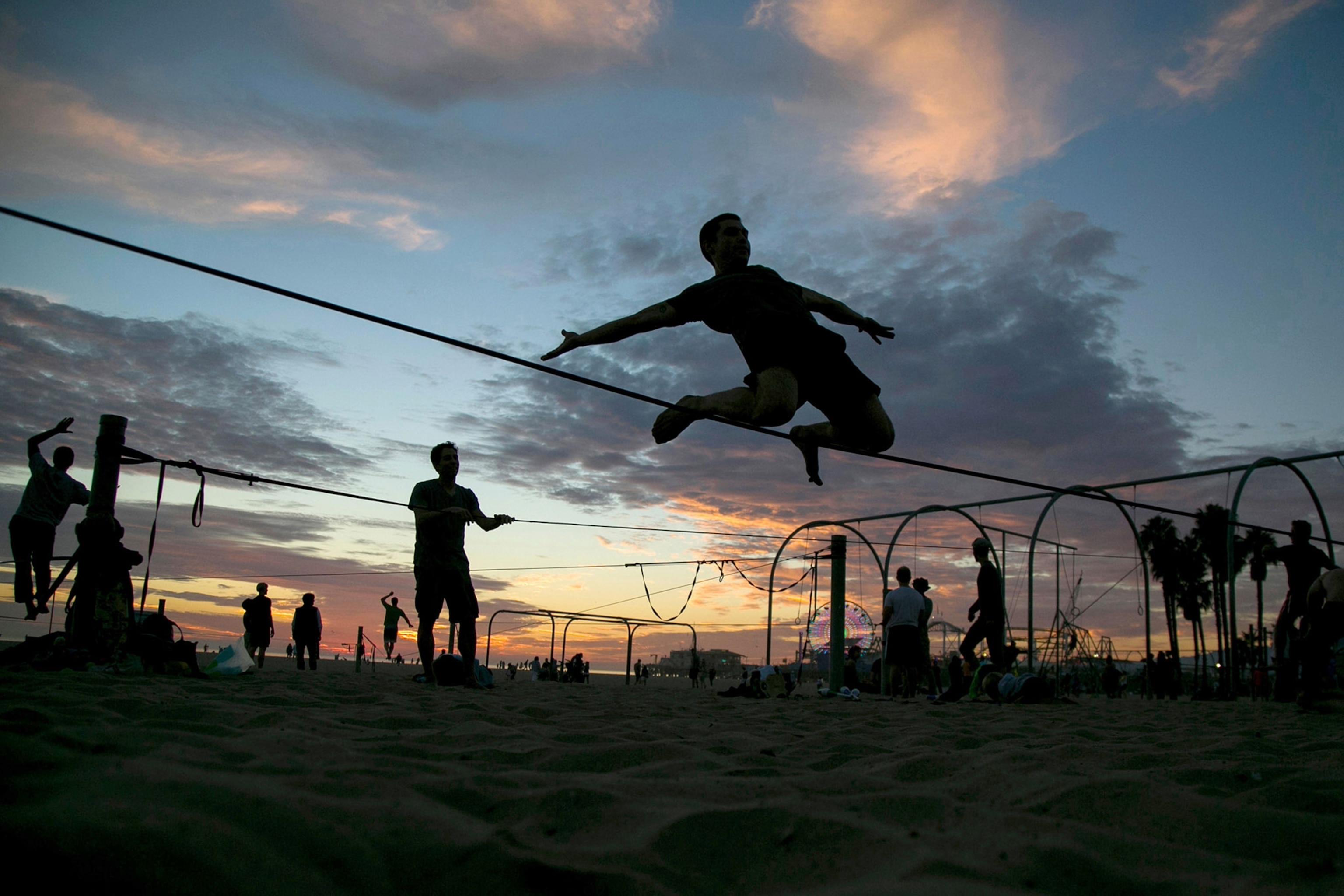 a slackliner in Santa Monica, California
