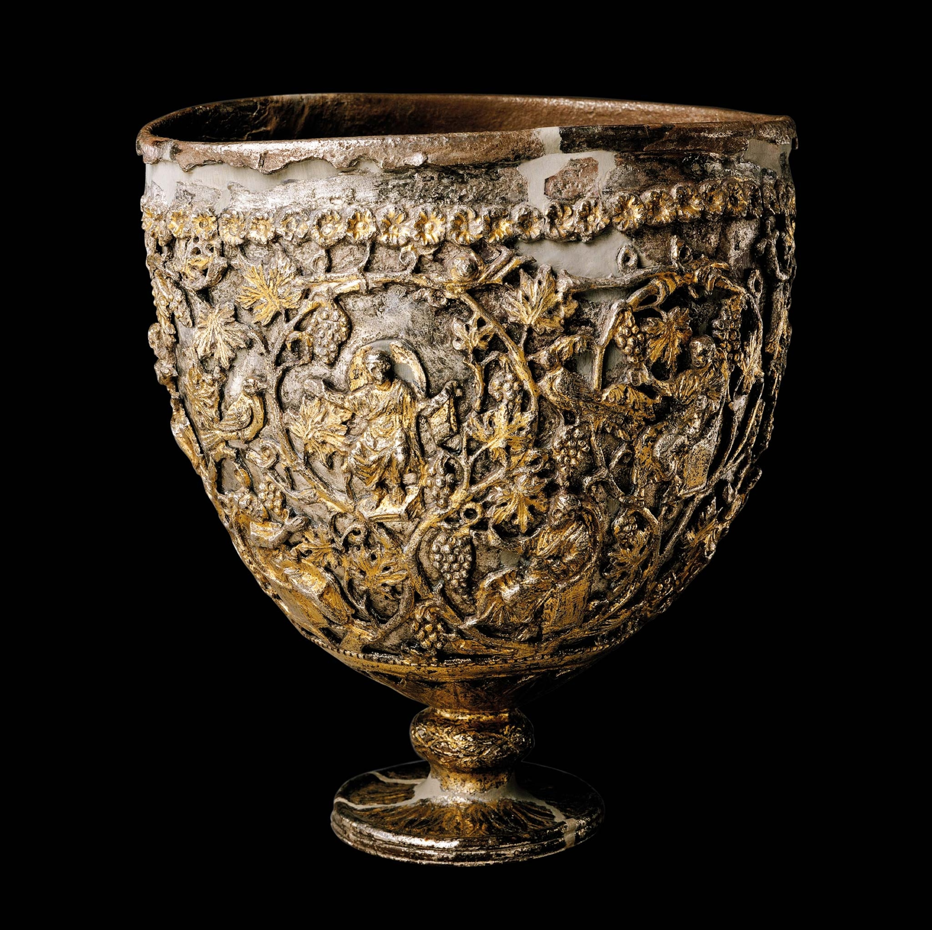 A metal cup engraved with leaves and men, claimed to be the Holy Grail