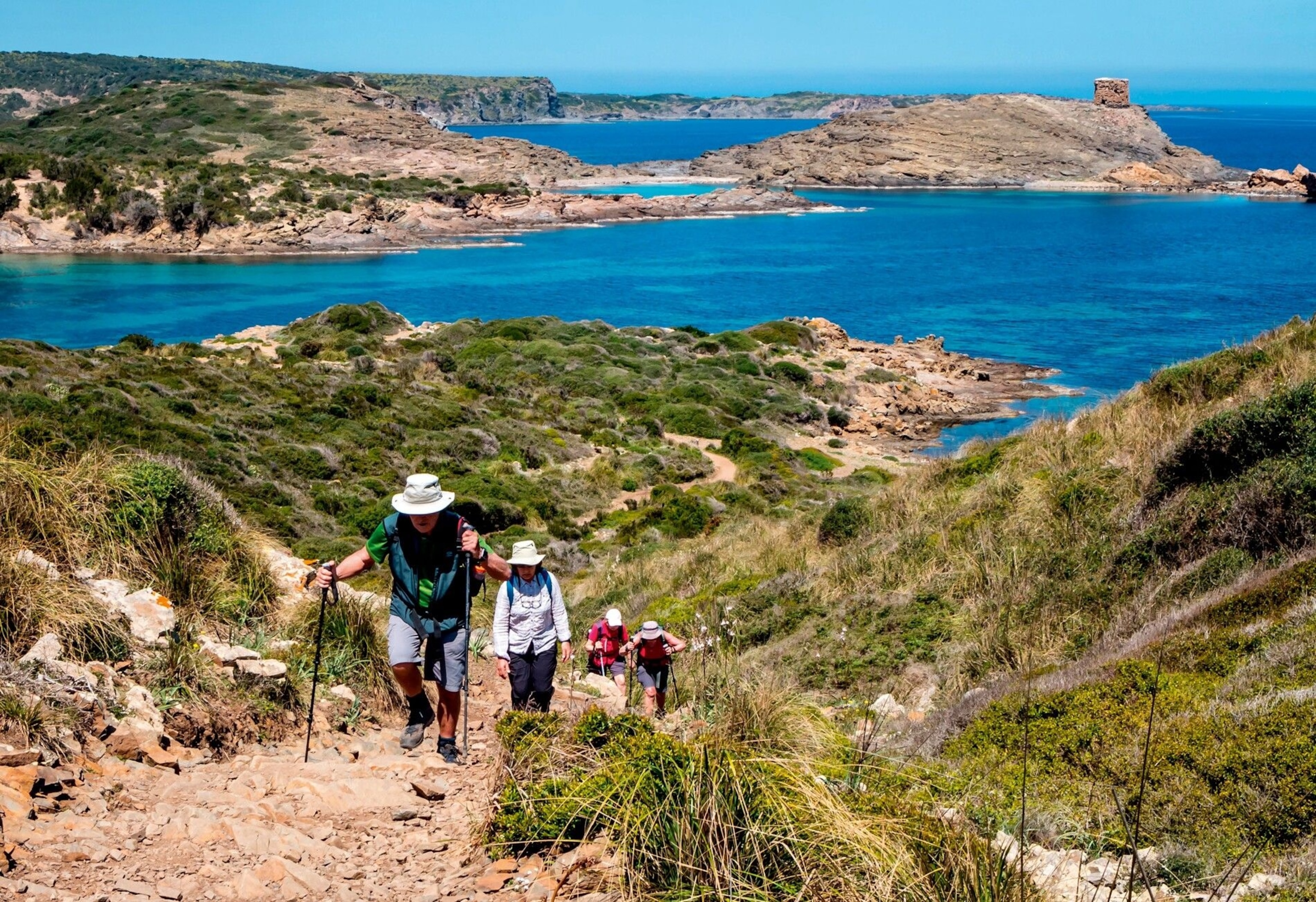 Hikers at the sea