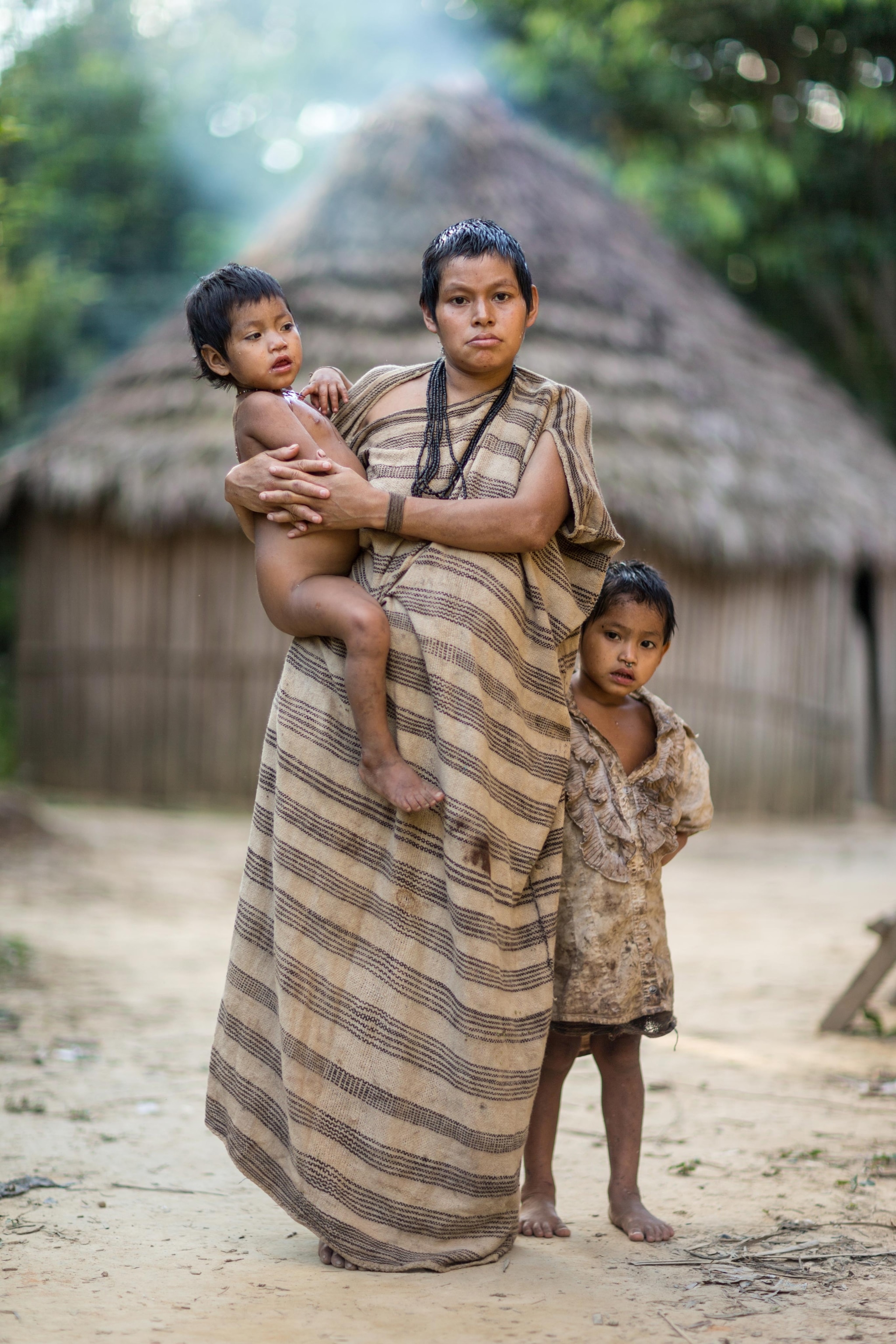 a Matsigenka woman and her children in Manú, Peru