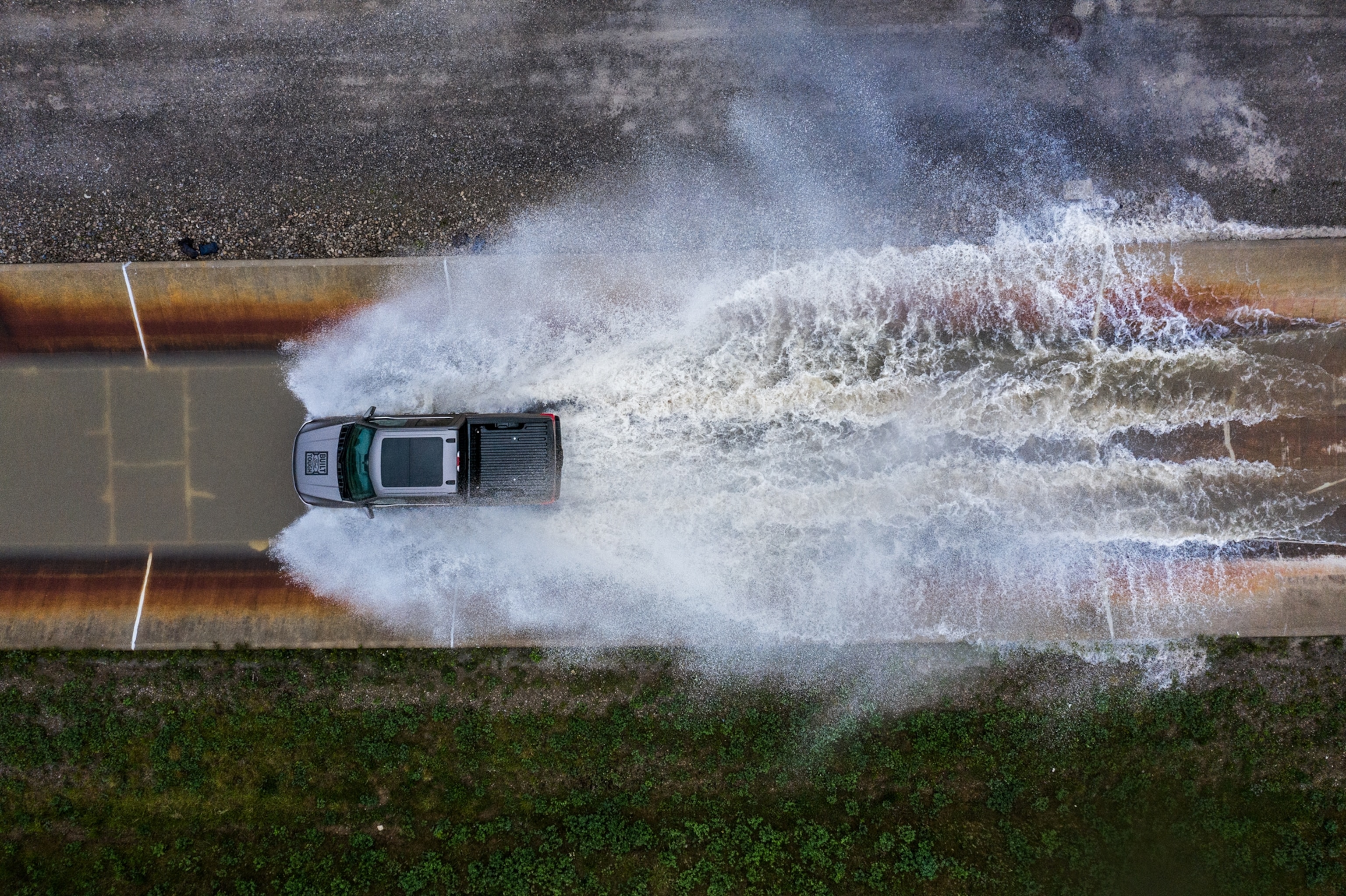 Picture of look from above of a truck tested in a water crossing