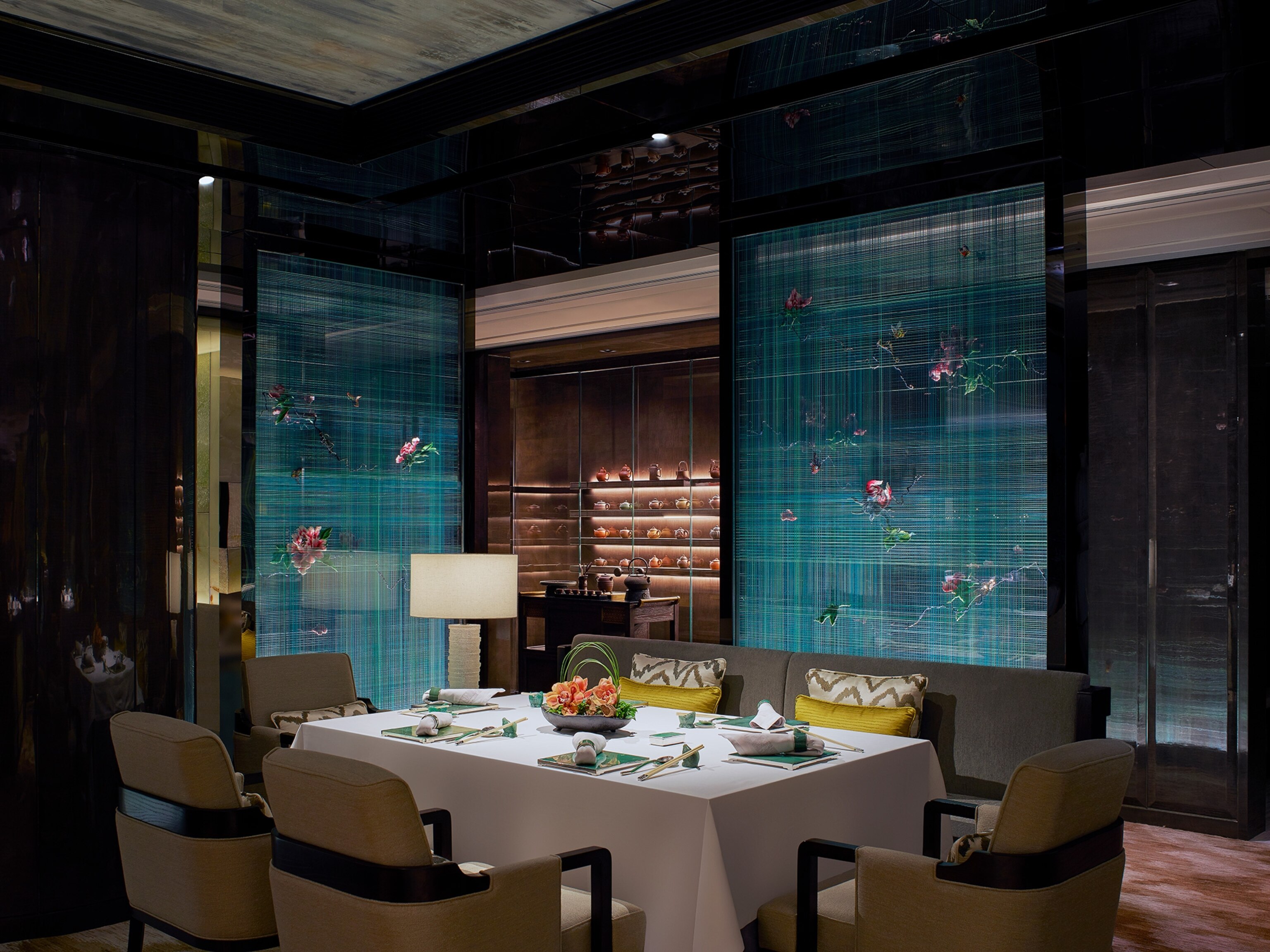 A table in the main dining area at Lai Ching Heen Restaurant in Hong Kong.