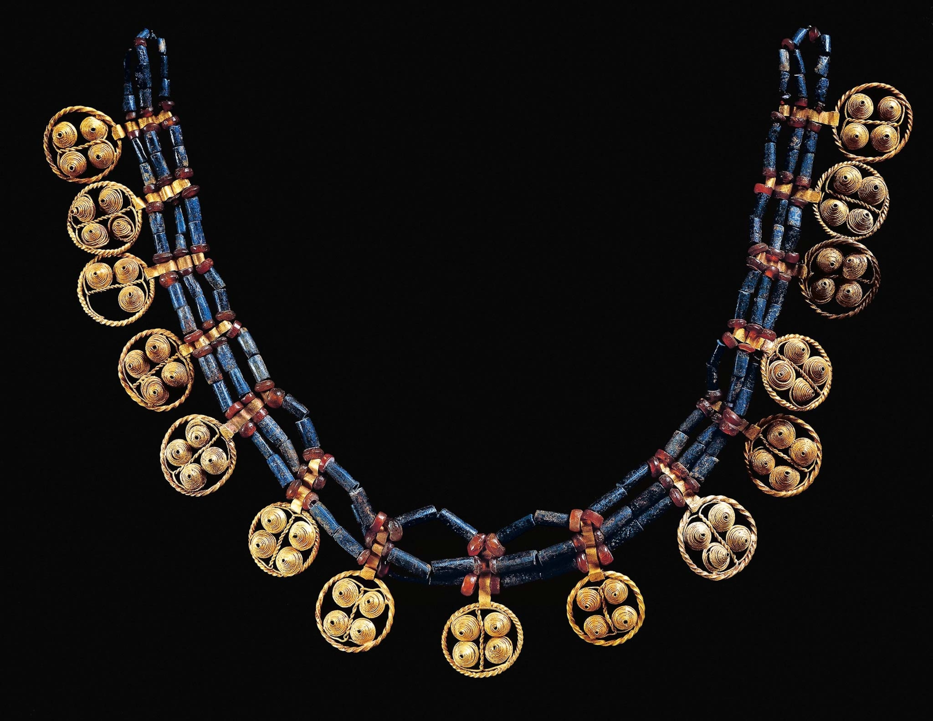 A necklace of carnelian, lapis lazuli, and gold from circa 2450 B.C. from a tomb in Ur.