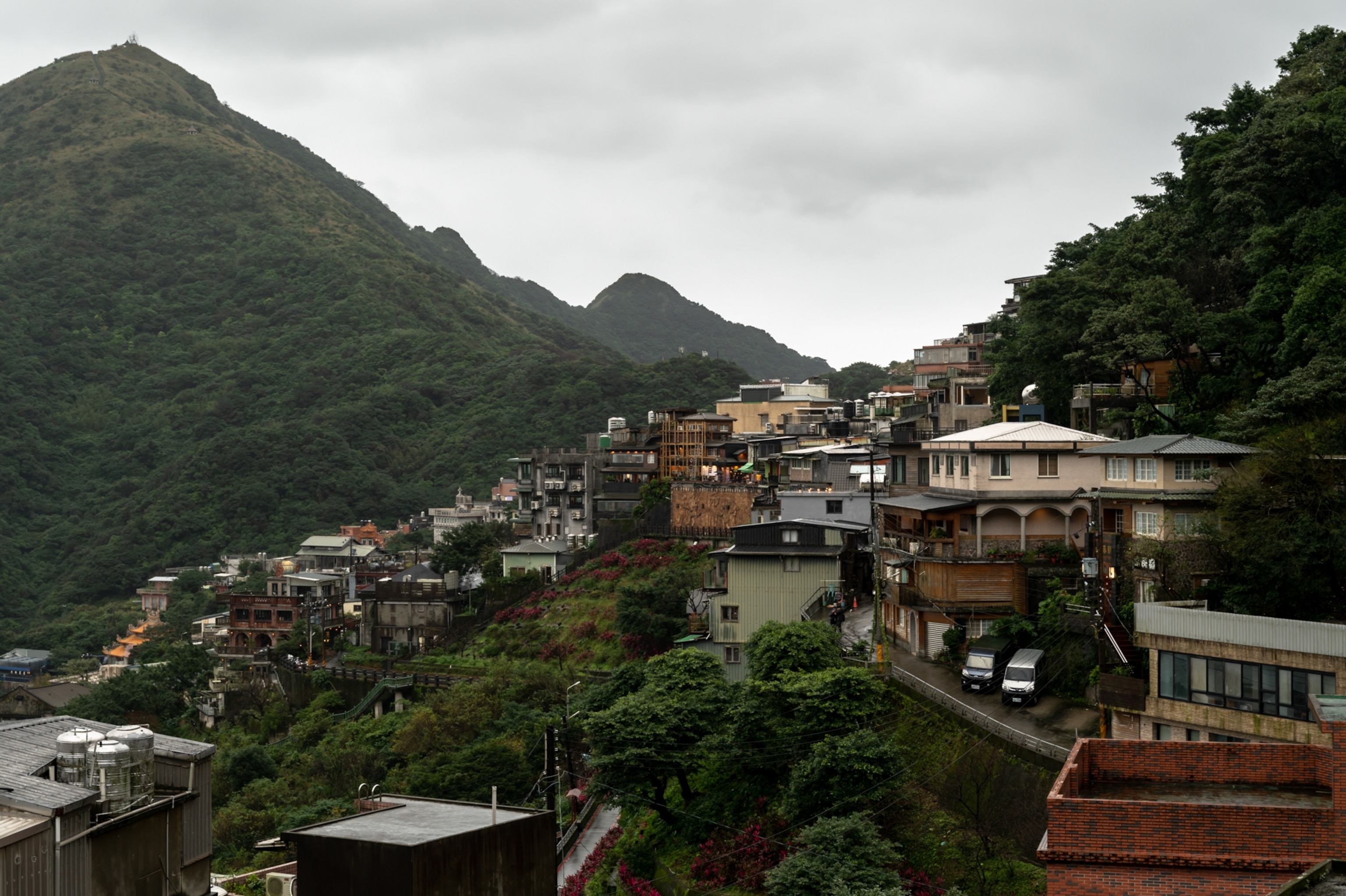 village surrounded by mountains