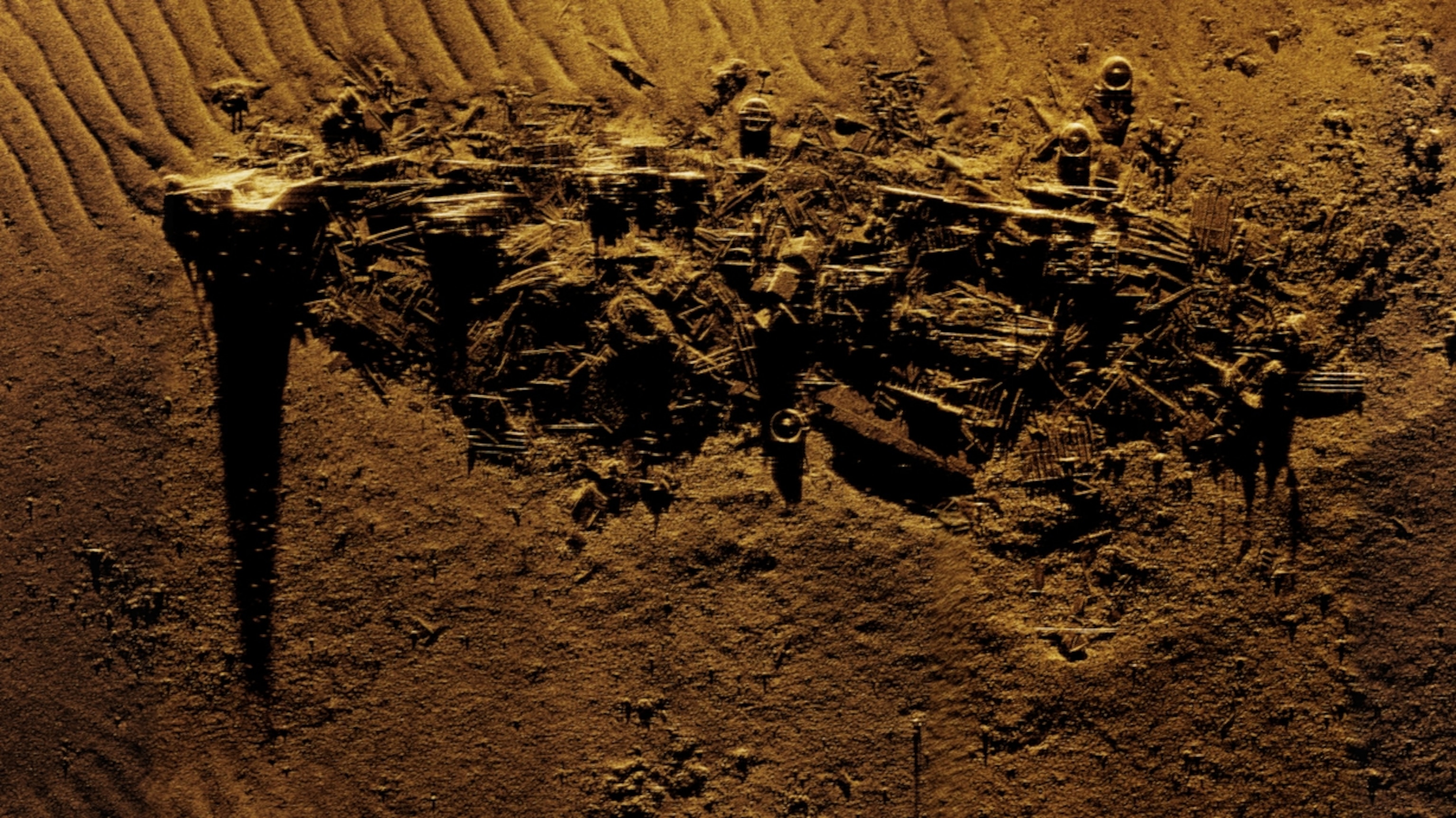 A detailed sonar scan revealing a scattering of wreckage from a ship.