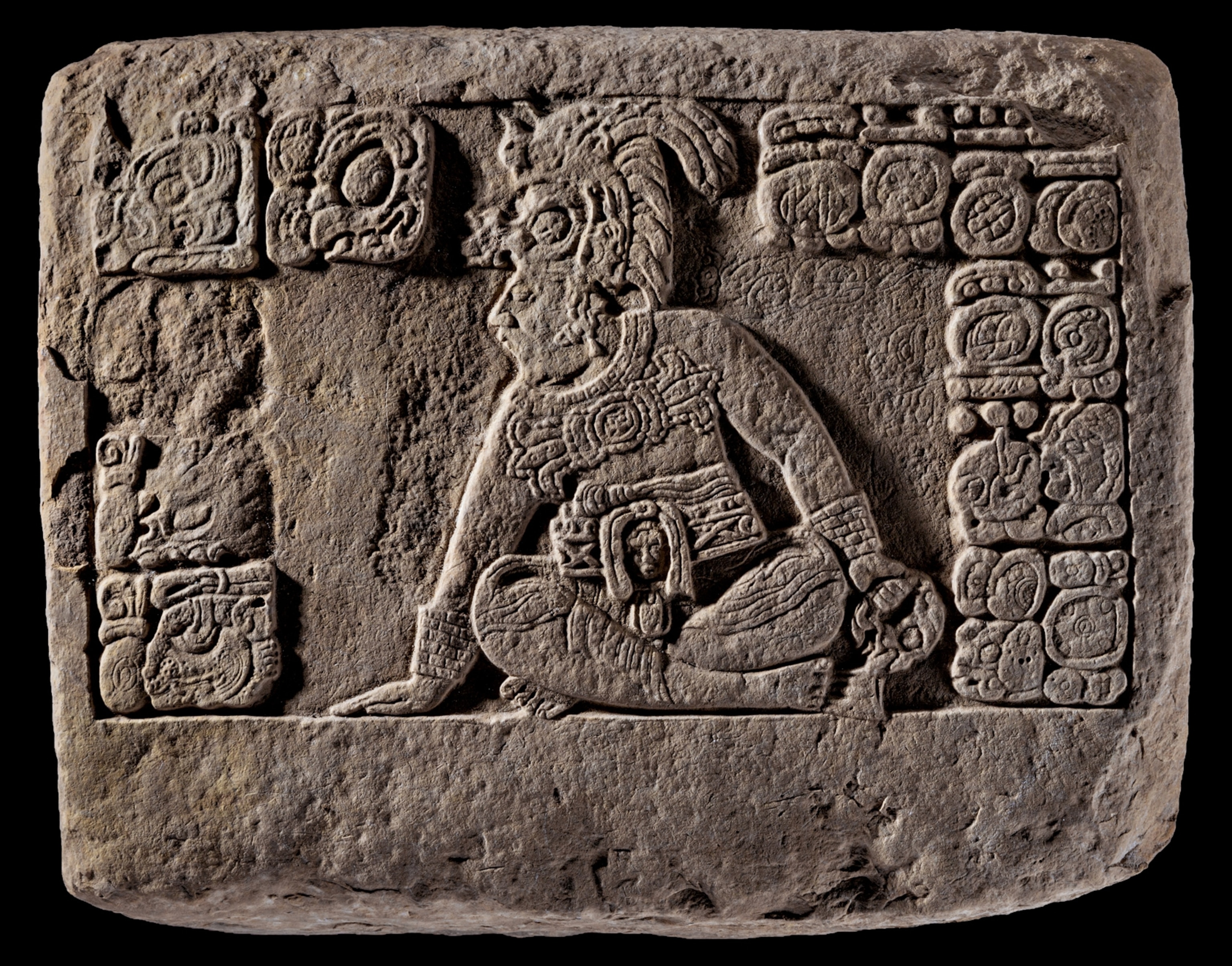a relief from the ancient city of Saknikte showing future Snake King Yuknoom Cheen II