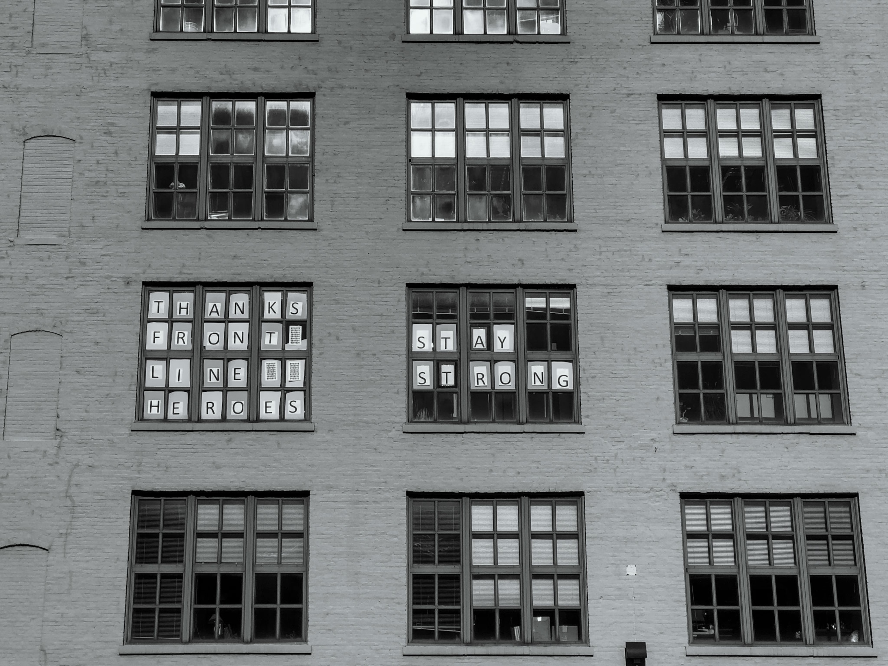 signs in people's windows honoring healthcare workers