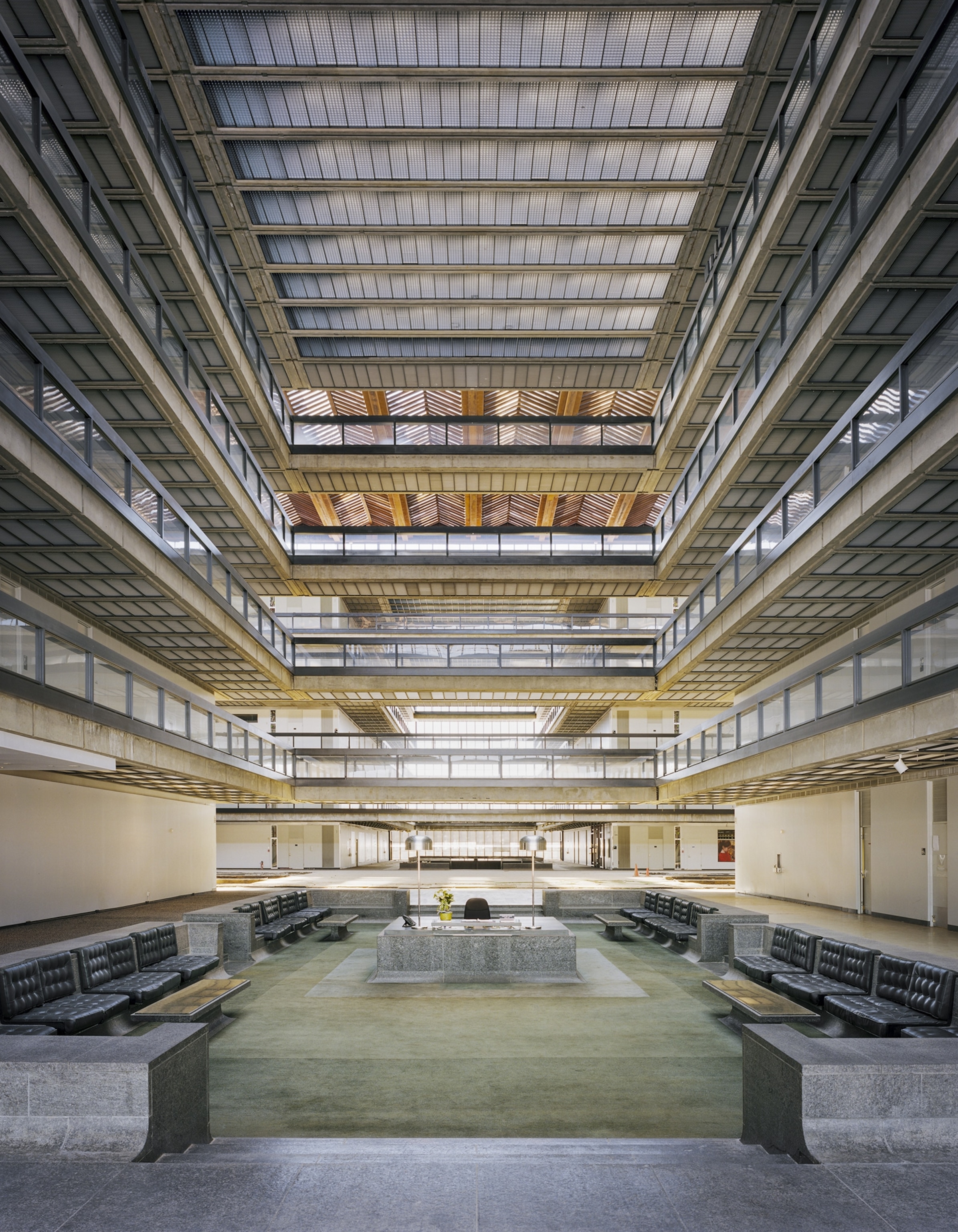The front desk sits in the center of the massive Bell Labs entrance.