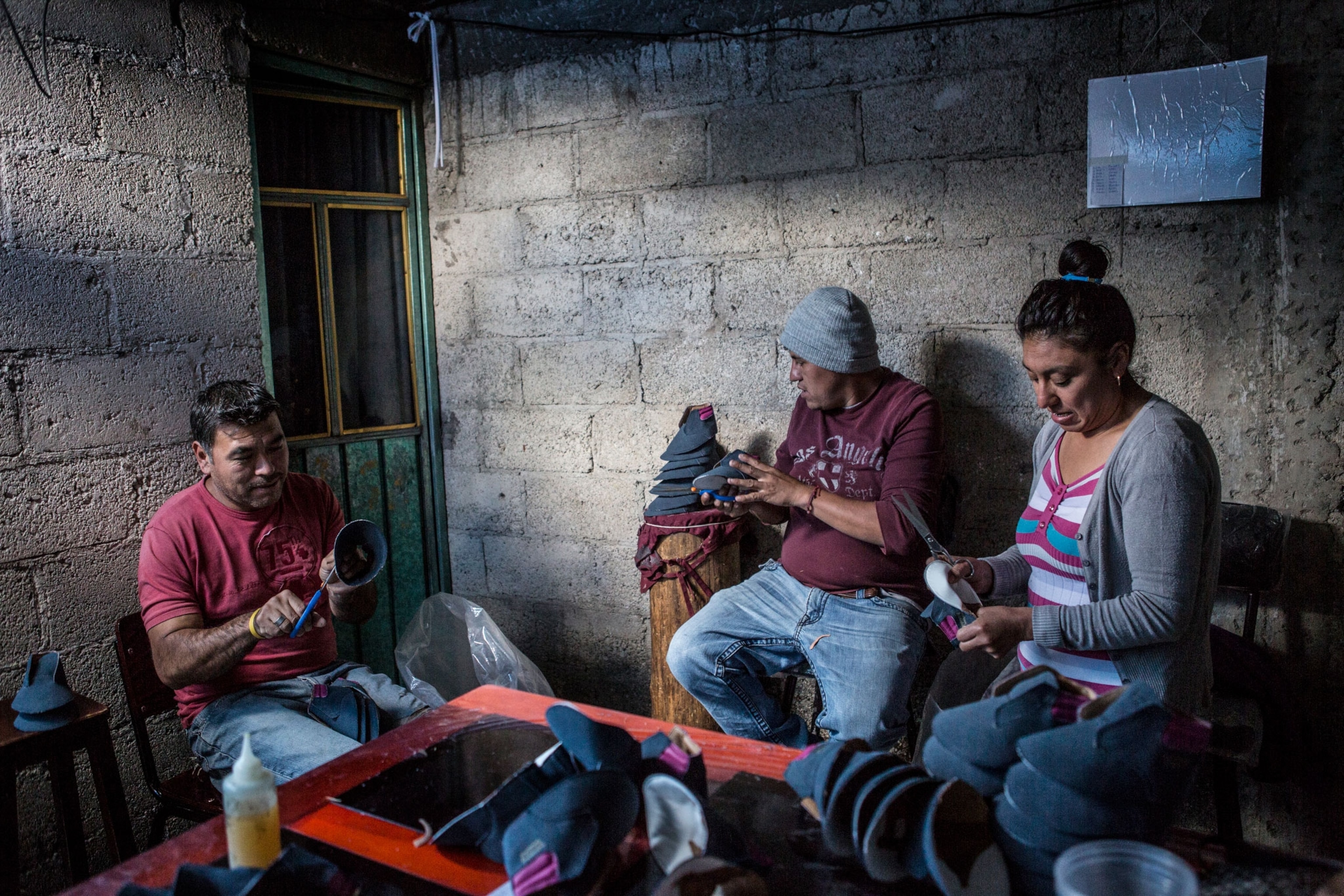 people making shoes