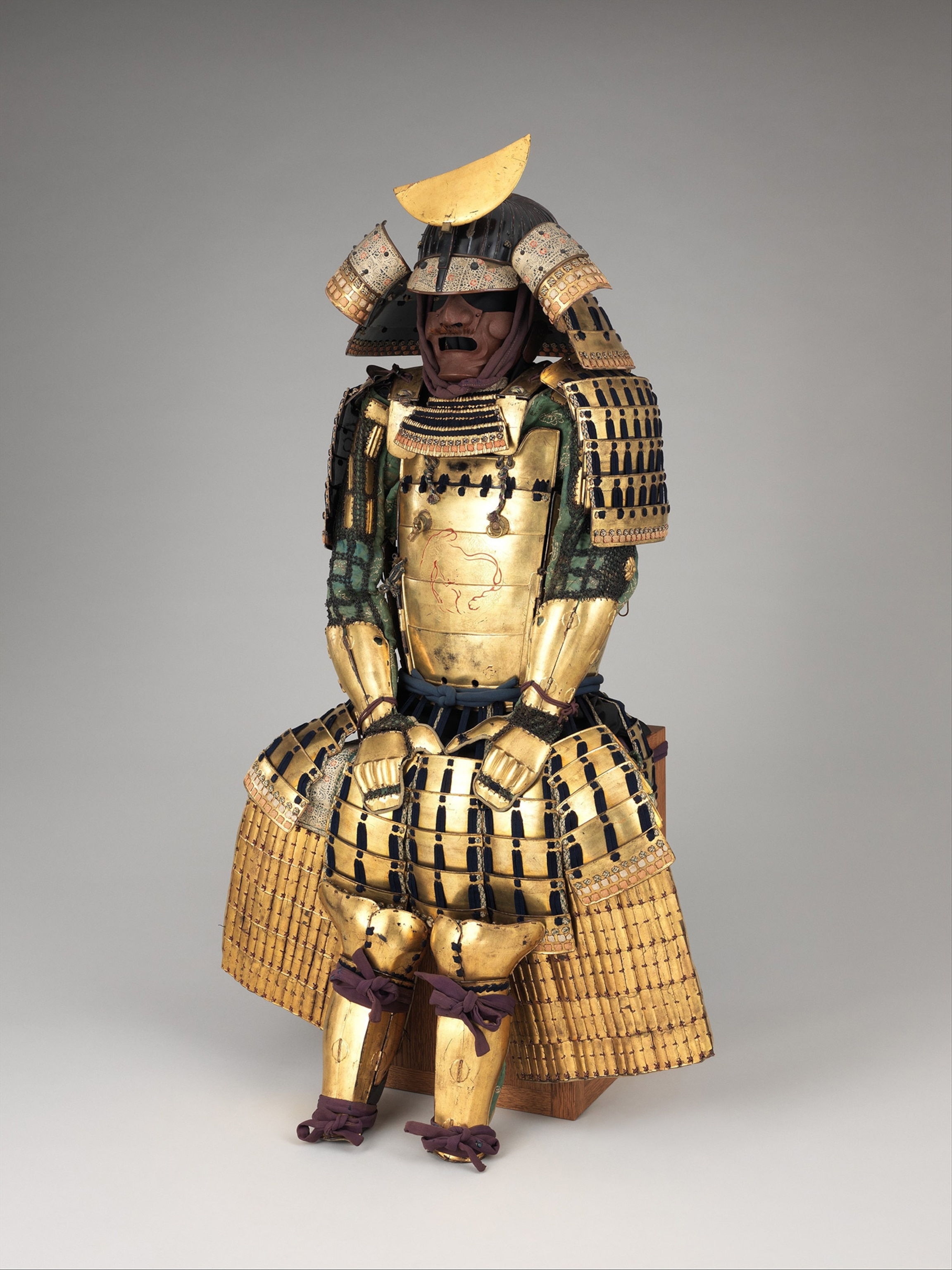 A suit of armor clad in gold.