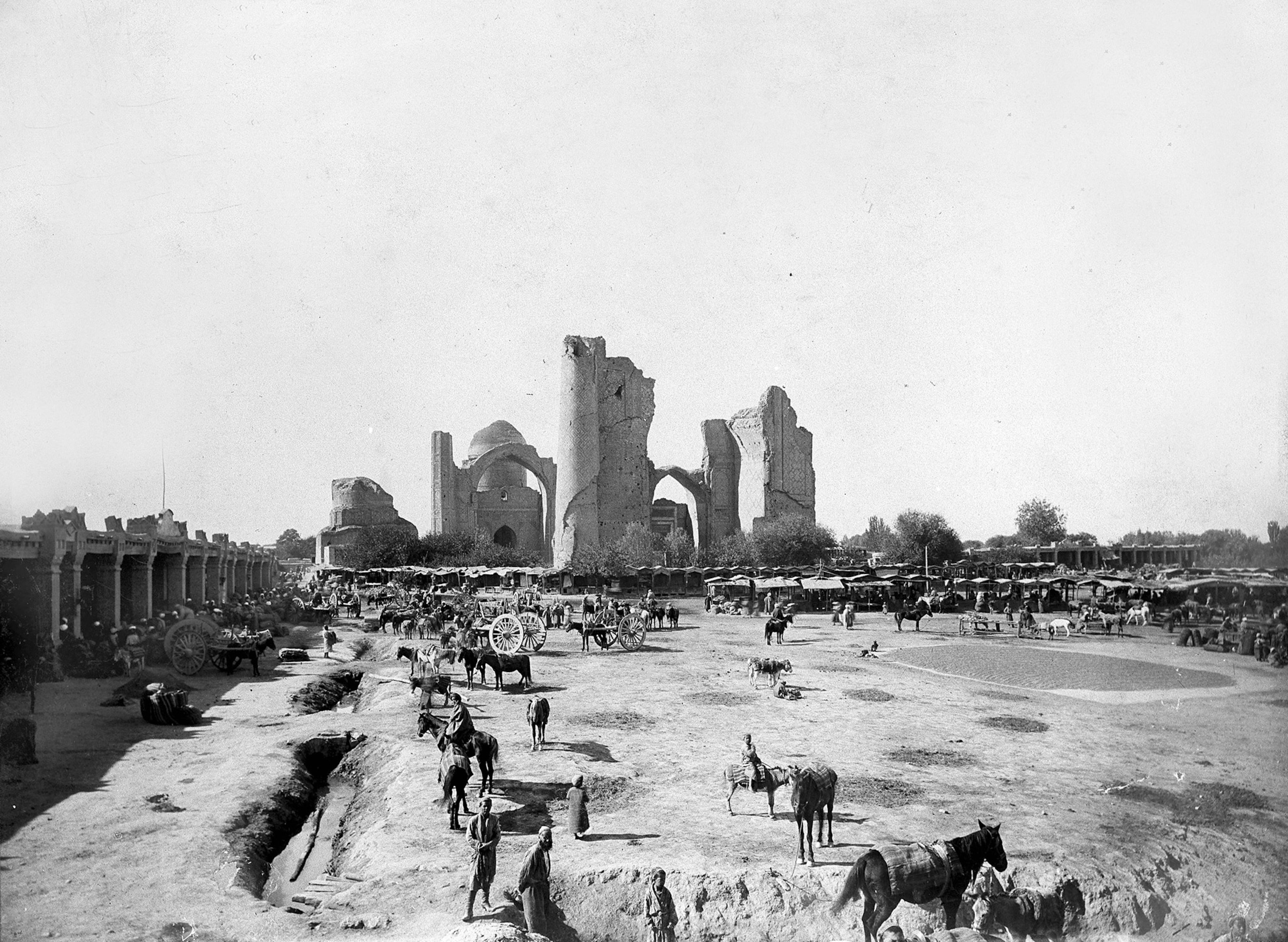 An archival photo of the marketplace in Samarkand, Uzbekistan, circa 1910. In the background are the remains of the Bibi-Khanym Mosque, partially destroyed by an earthquake in 1897