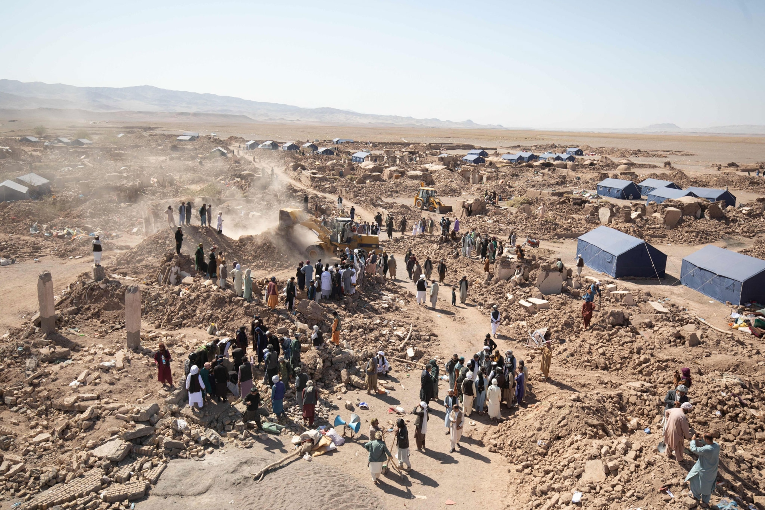 a view of a village destroyed from an earthquake