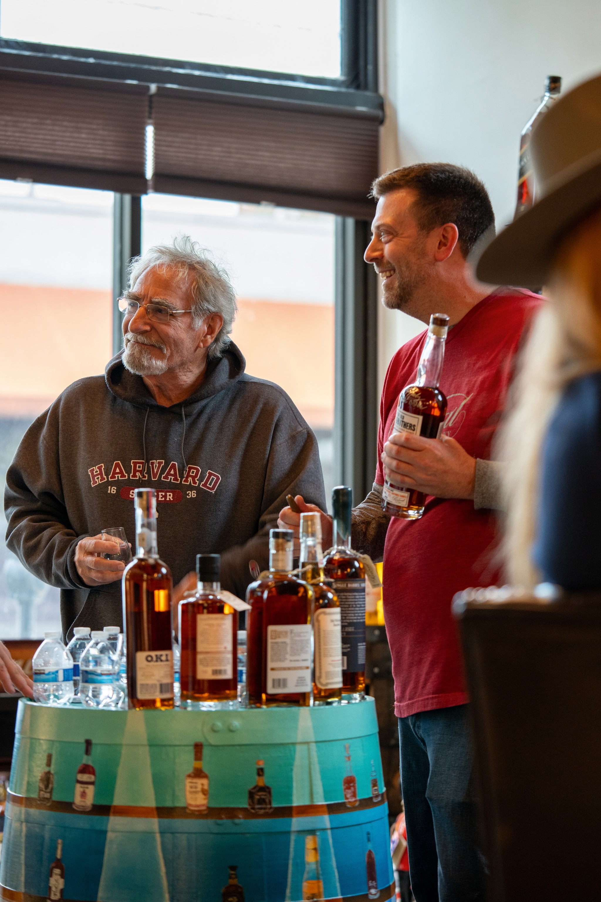 two men at a distillery