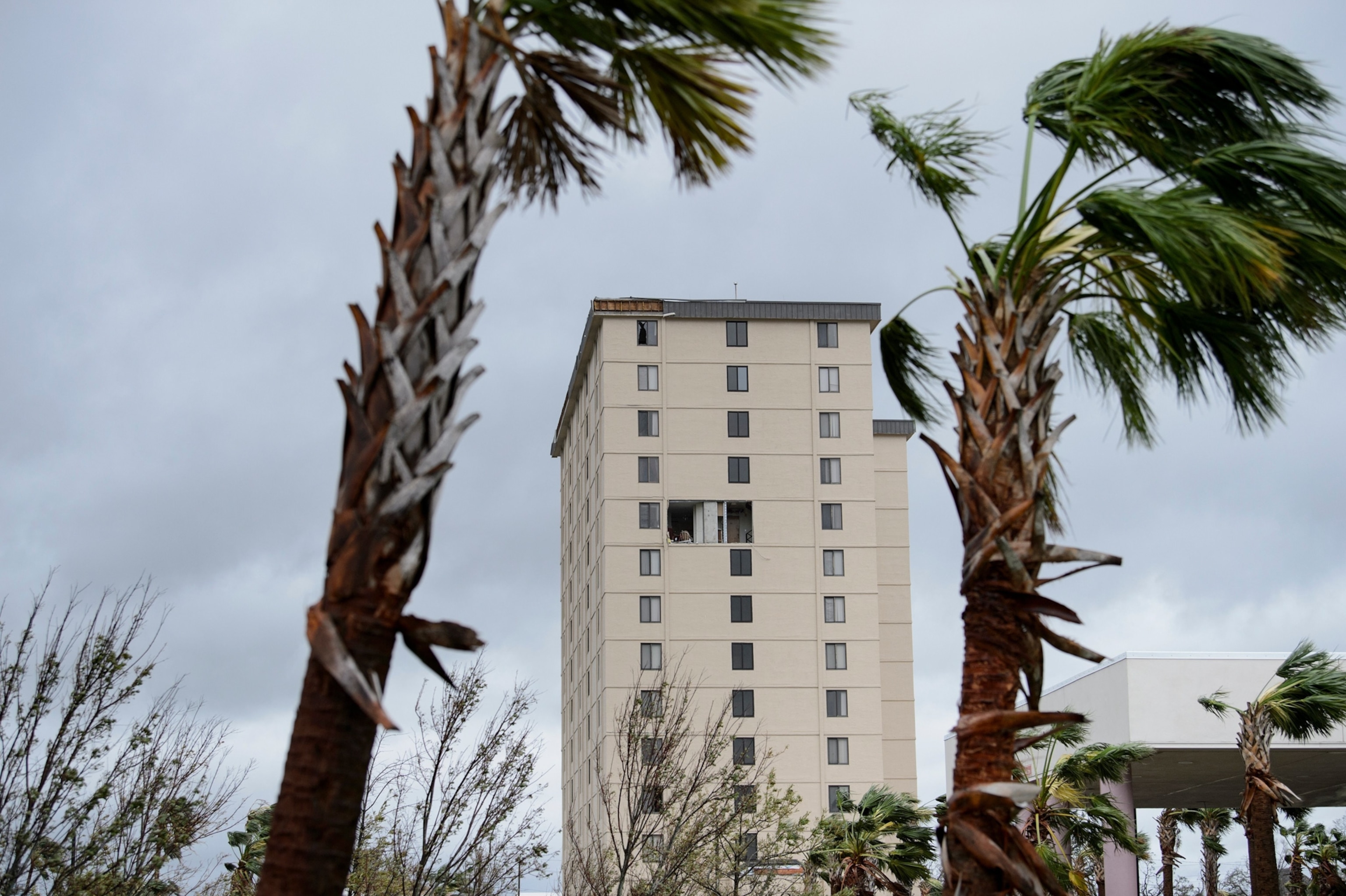 building with storm damage after Hurricane Michael