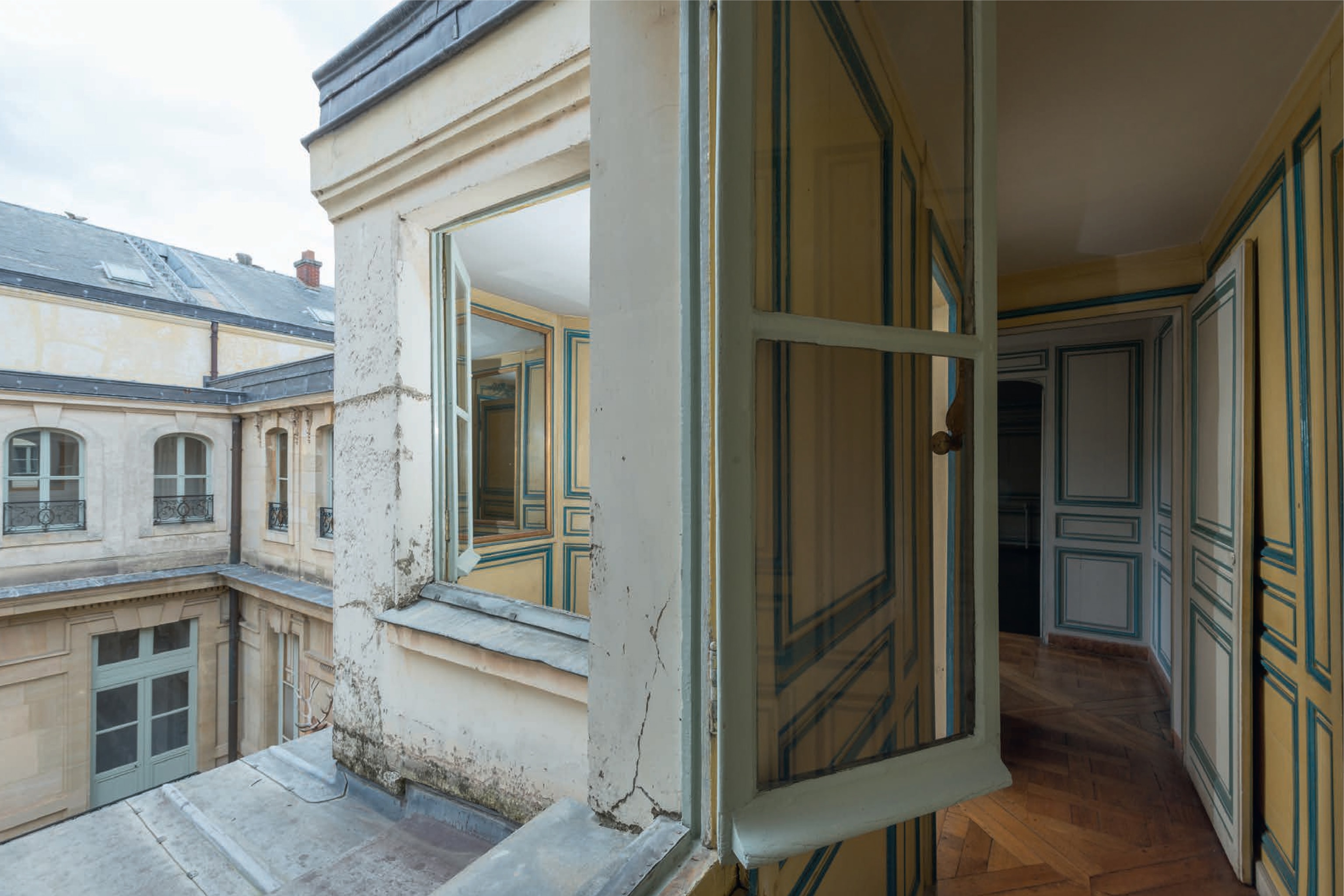 a corridor overlooking Stag Courtyard