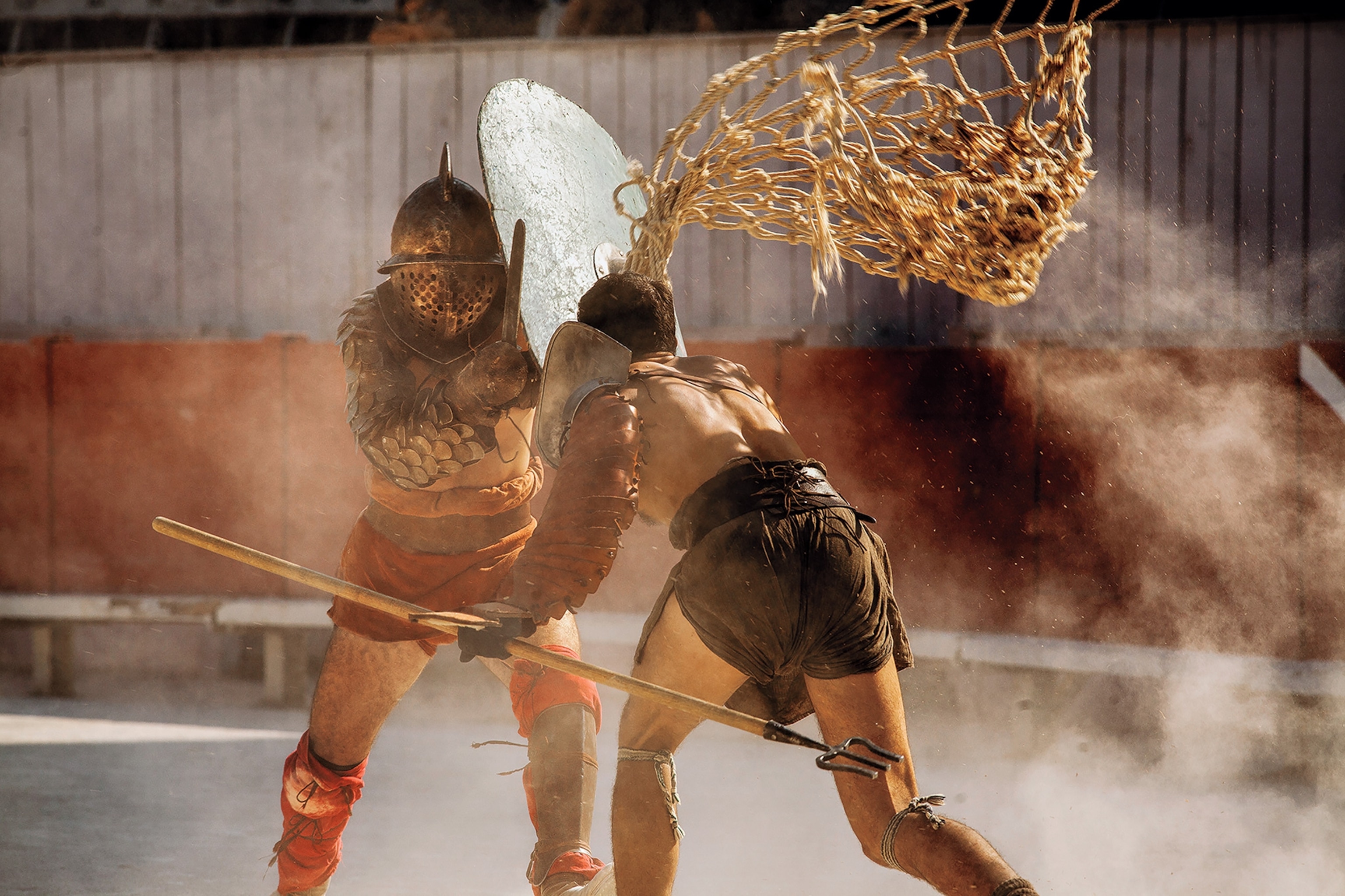 Gladiator reenactors clash in the dust of the 1,900-year-old Roman arena in Arles, France.
